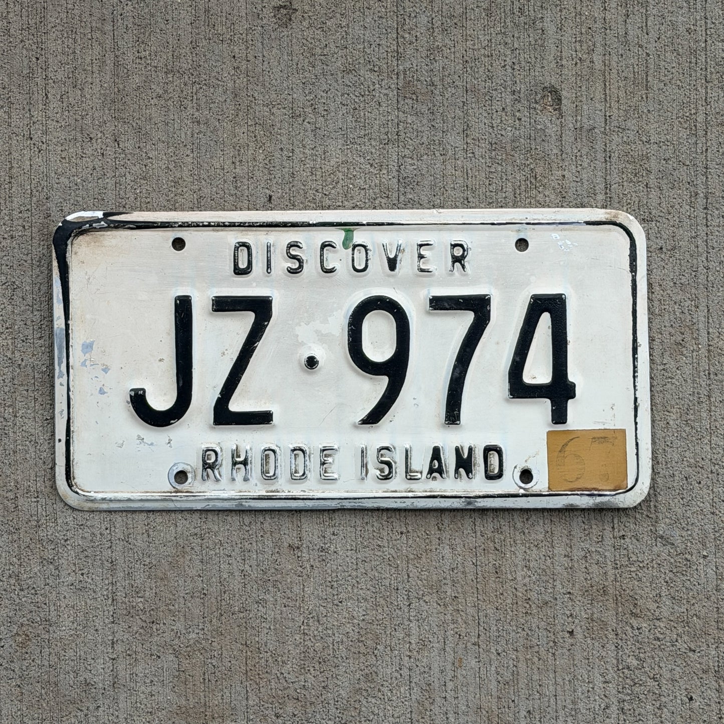 Photo of a 1967 Rhode Island License Plate Auto Tag Garage Decor Vintage JZ 974 with original patina