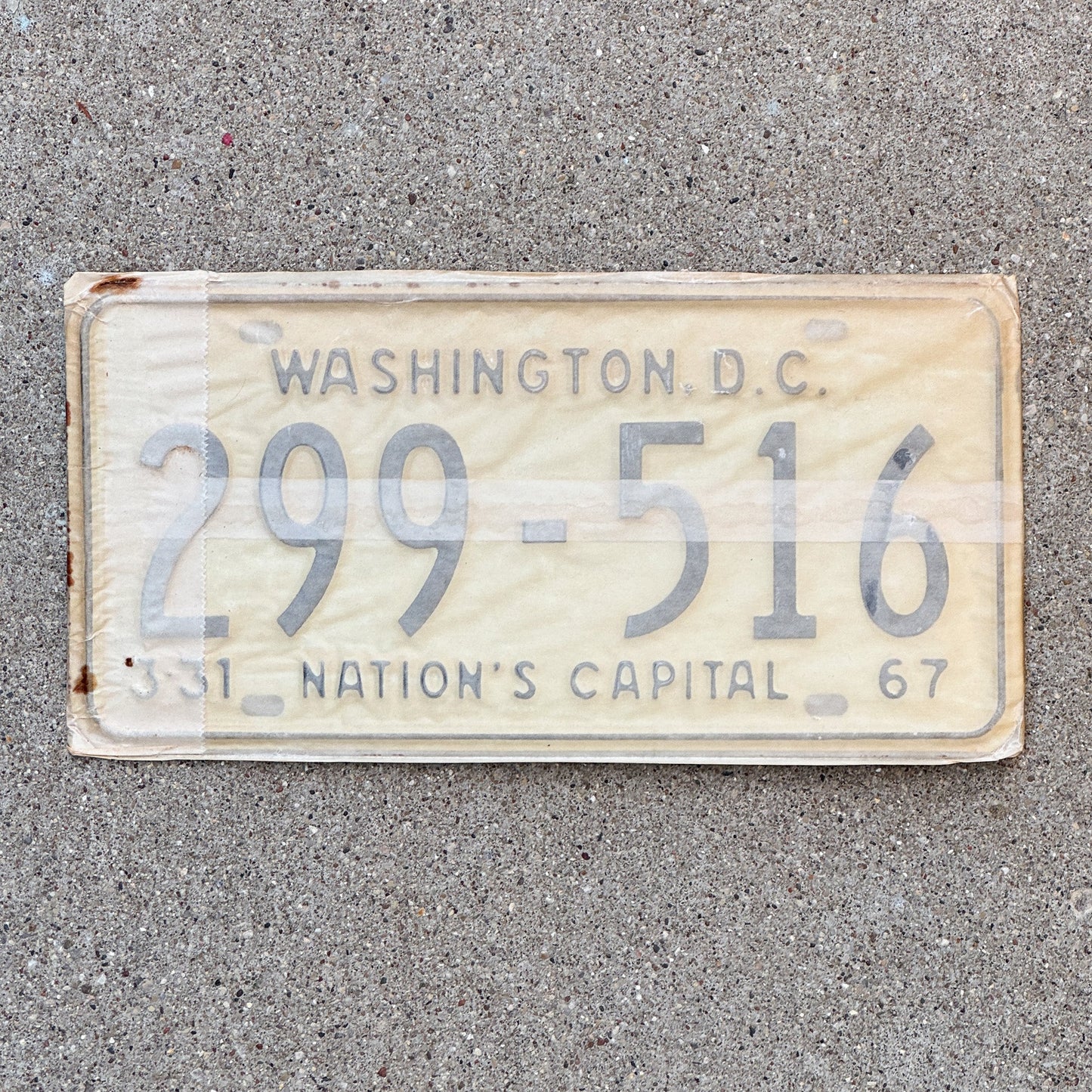 Photo of a 1967 Washington DC License Plate Pair Auto Tag Garage Decor Vintage with Envelope 299 516 with original patina