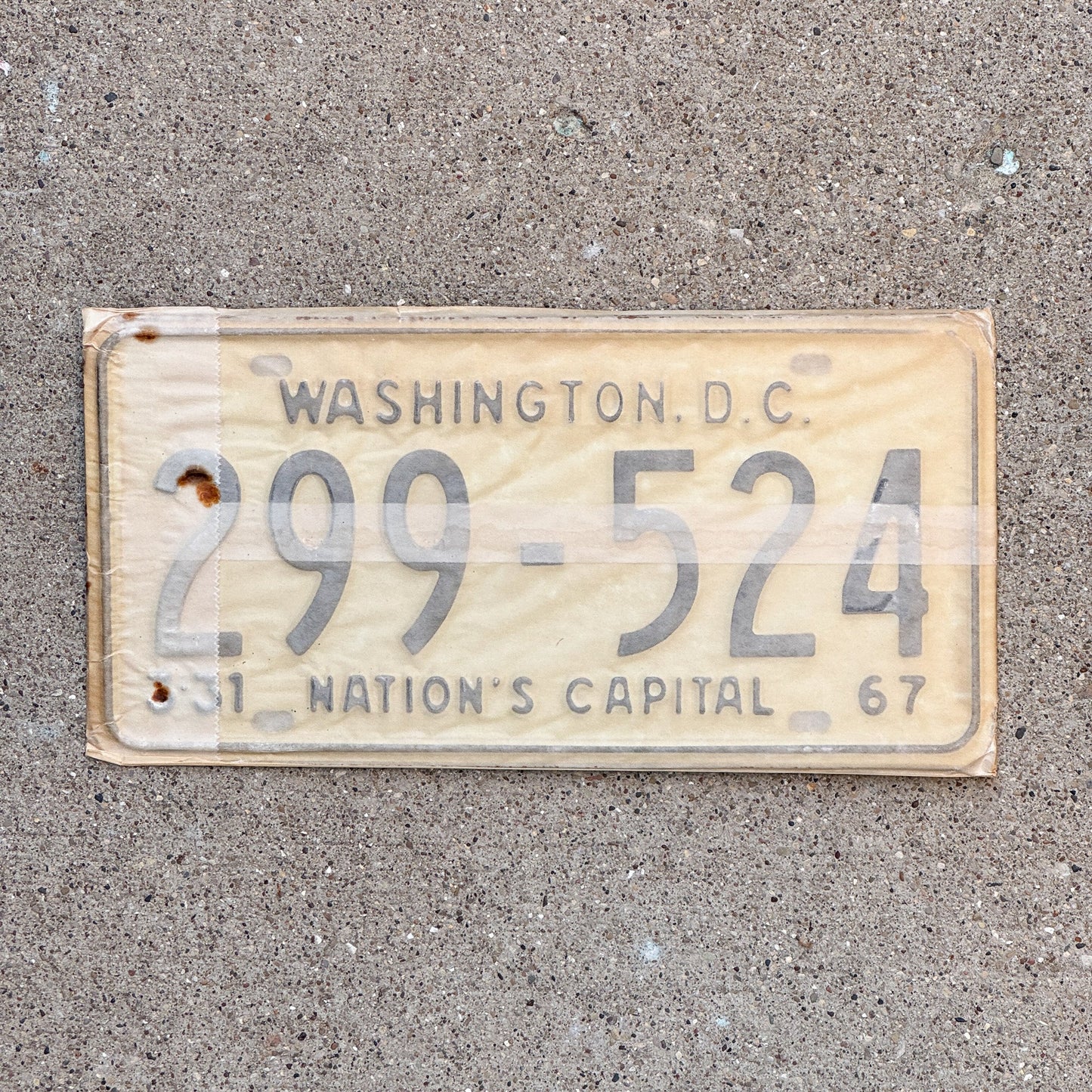 Photo of a 1967 Washington DC License Plate Pair Auto Tag Garage Decor Vintage with Envelope 299 524 with original patina