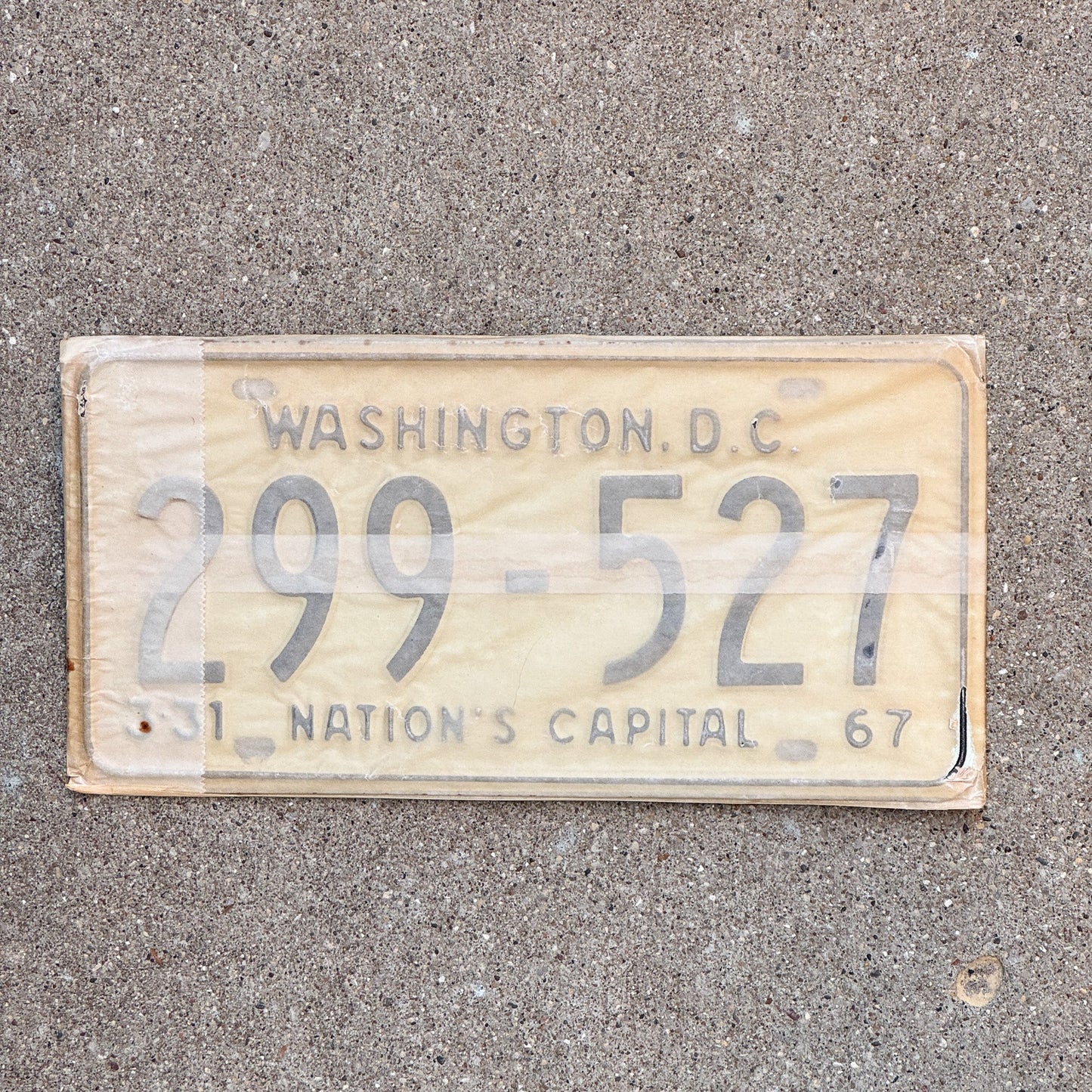 Photo of a 1967 Washington DC License Plate Pair Auto Tag Garage Decor Vintage with Envelope 299 527 with original patina