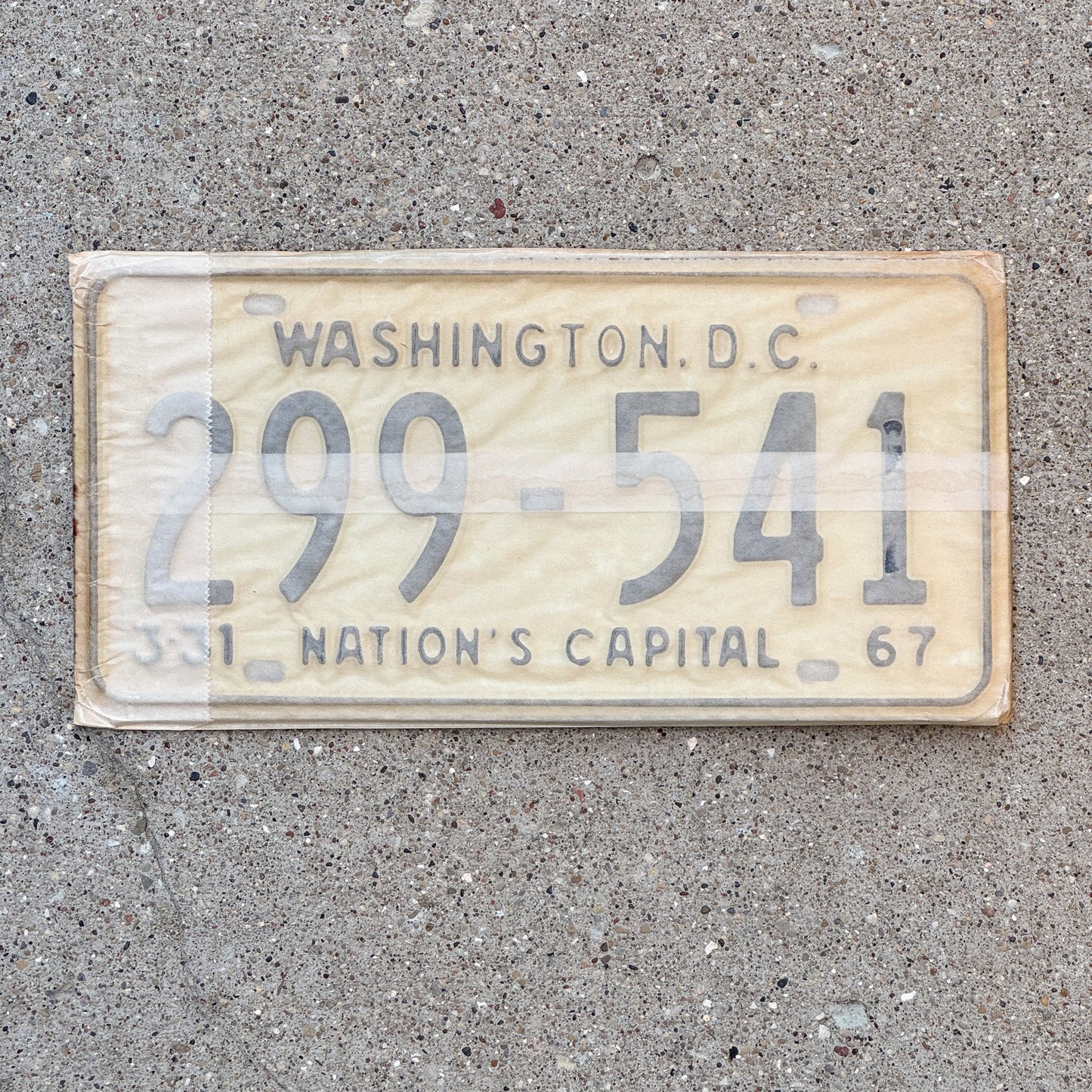 Photo of a 1967 Washington DC License Plate Pair Auto Tag Garage Decor Vintage with Envelope 299 541 with original patina