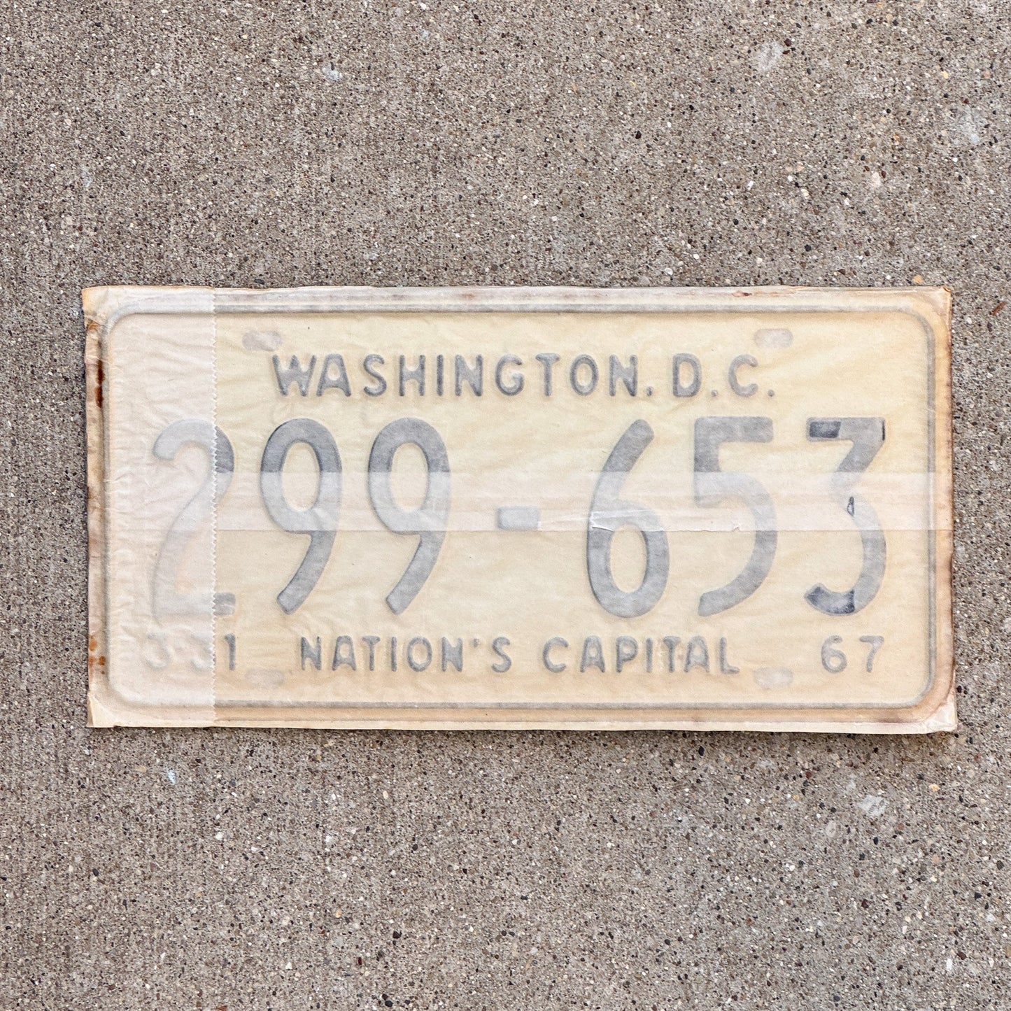 Photo of a 1967 Washington DC License Plate Pair Auto Tag Garage Decor Vintage with Envelope 299 653 with original patina