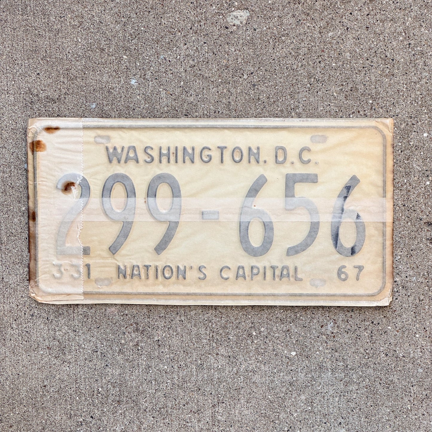 Photo of a 1967 Washington DC License Plate Pair Auto Tag Garage Decor Vintage with Envelope 299 656 with original patina