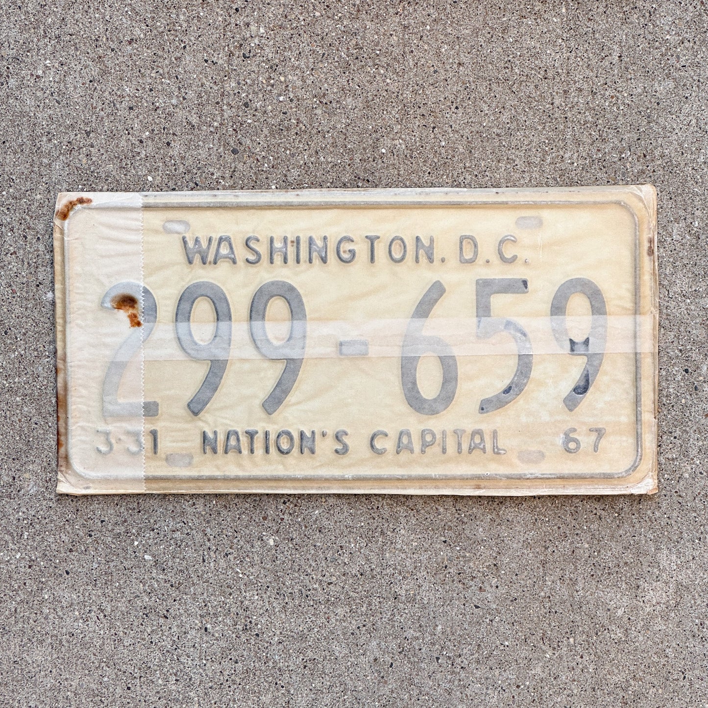 Photo of a 1967 Washington DC License Plate Pair Auto Tag Garage Decor Vintage with Envelope 299 659 with original patina