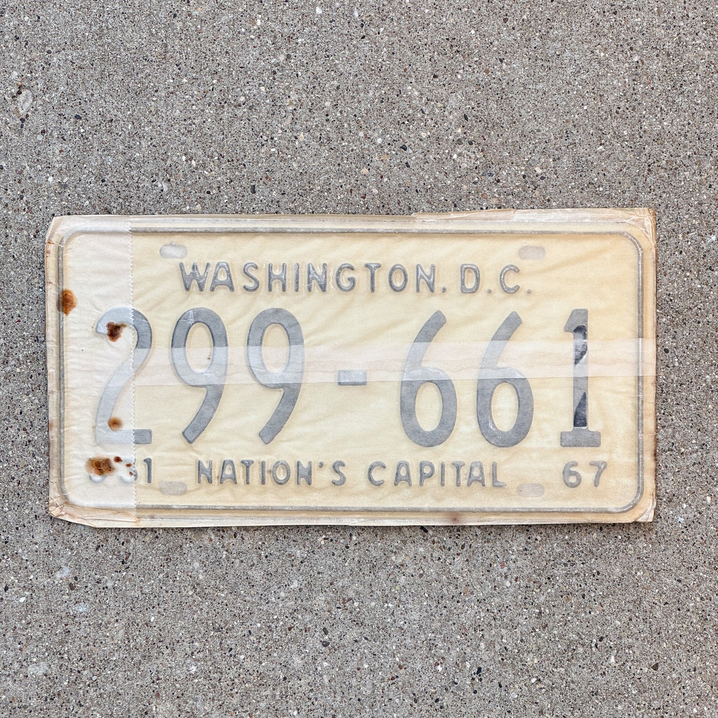 Photo of a 1967 Washington DC License Plate Pair Auto Tag Garage Decor Vintage with Envelope 299 661 with original patina