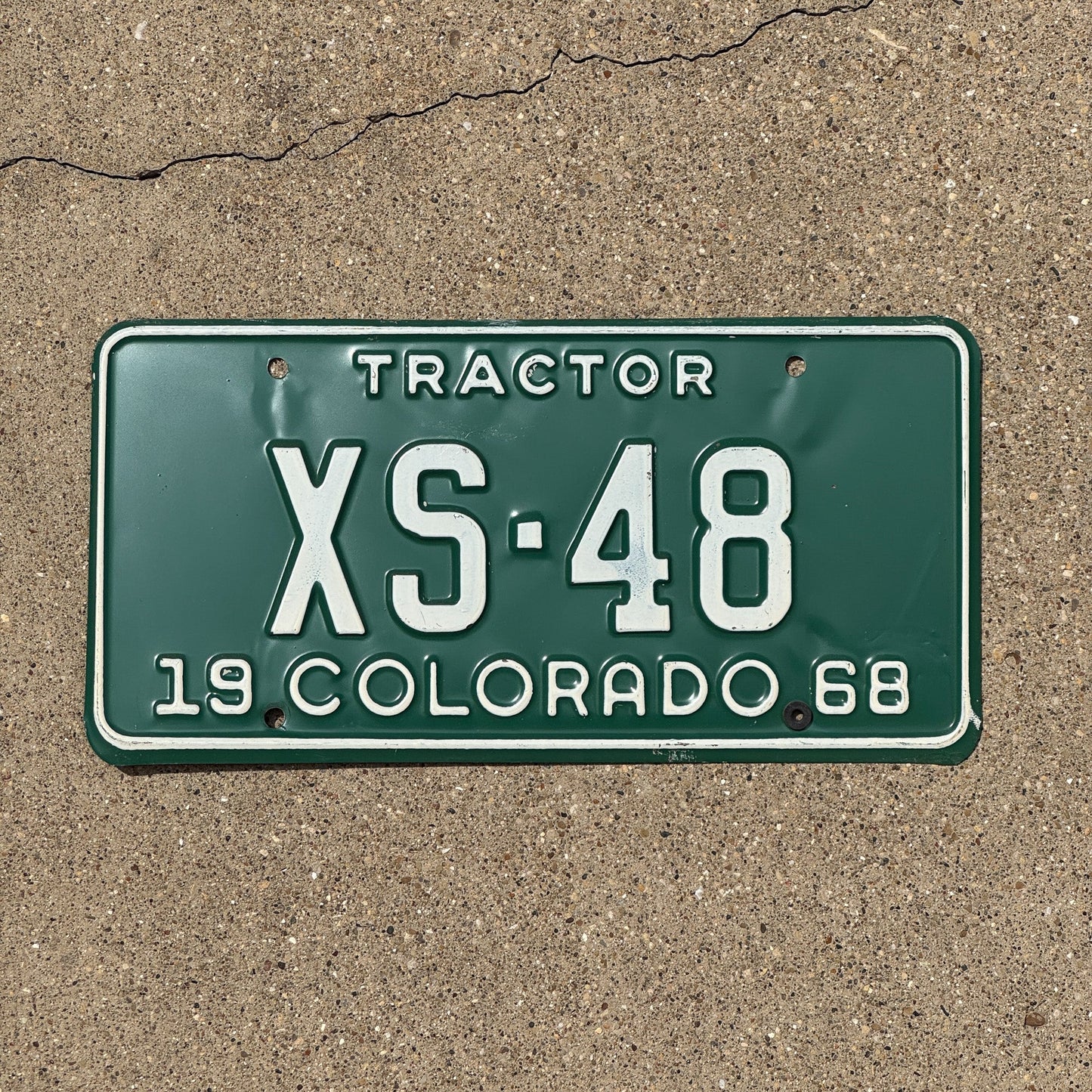 Photo of a 1968 Colorado Tractor License Plate Auto Tag Garage Decor Vintage XS 48