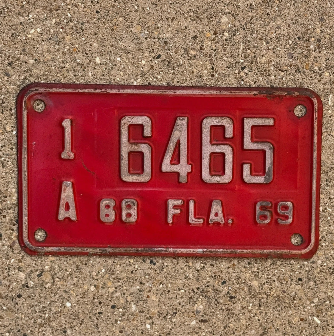 Photo of a 1968 Florida Motorcycle License Plate Auto Tag Garage Decor Vintage 1 A 6465 with original patina