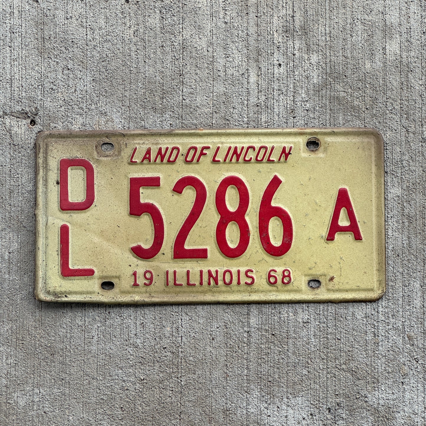 Photo of a 1968 Illinois Dealer License Plate Auto Tag 1 Vintage Garage 5286 A with original patina