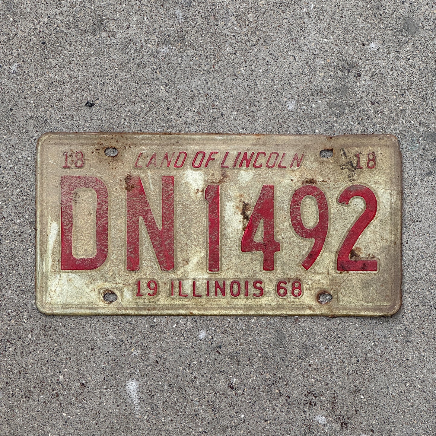 Photo of a 1968 Illinois License Plate Auto Tag 1 Vintage Garage DN 1492 with original patina