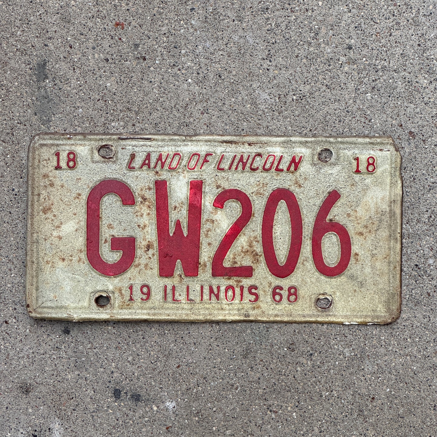 Photo of a 1968 Illinois License Plate Auto Tag 1 Vintage Garage GW 206 with original patina