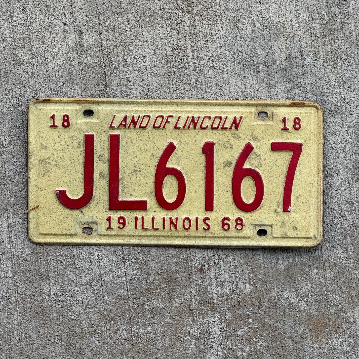 Photo of a 1968 Illinois License Plate Auto Tag 1 Vintage Garage JL 6167 with original patina