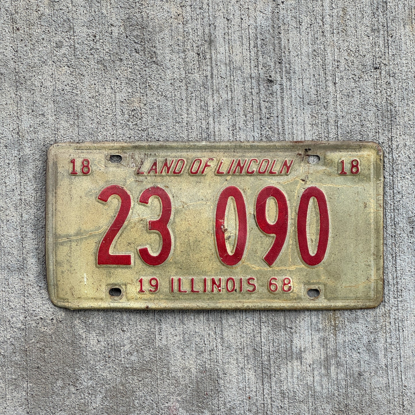 Photo of a 1968 Illinois License Plate Auto Tag 2 Vintage Garage 23 090 with original patina
