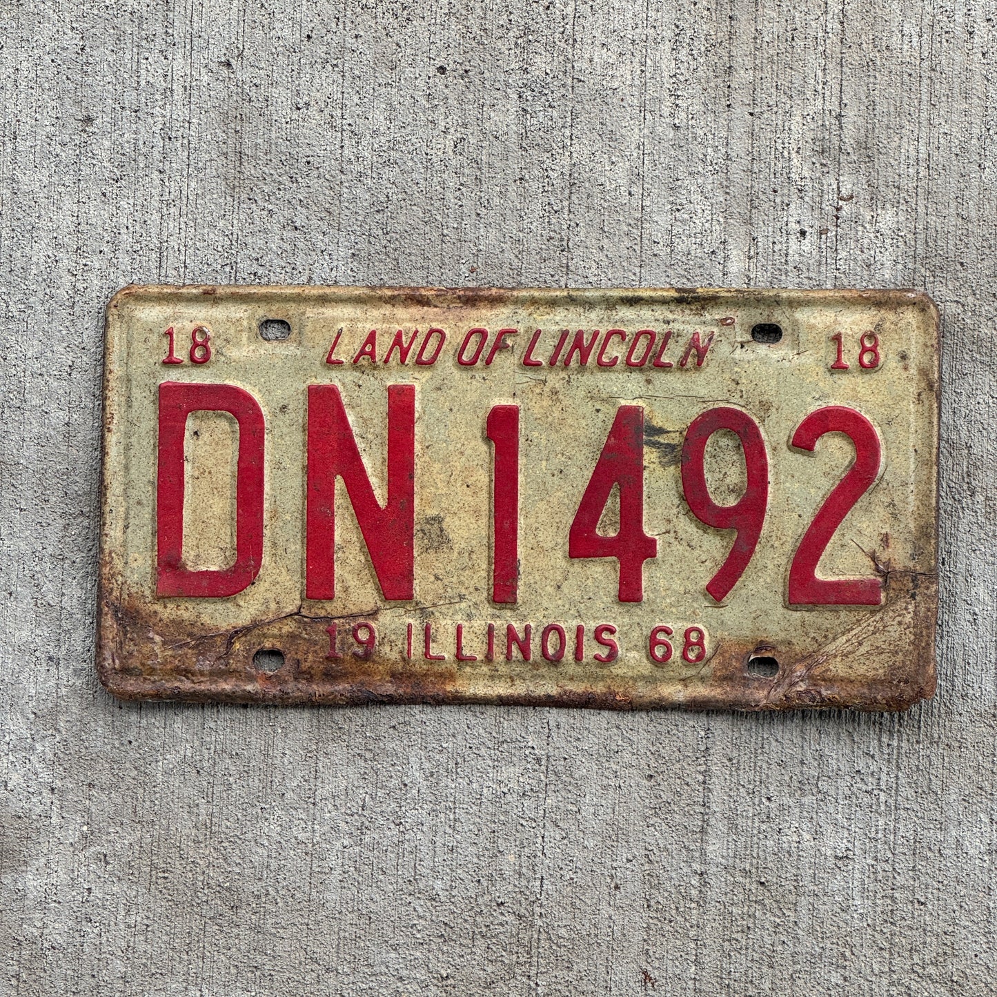 Photo of a 1968 Illinois License Plate Auto Tag 2 Vintage Garage DN 1492 with original patina