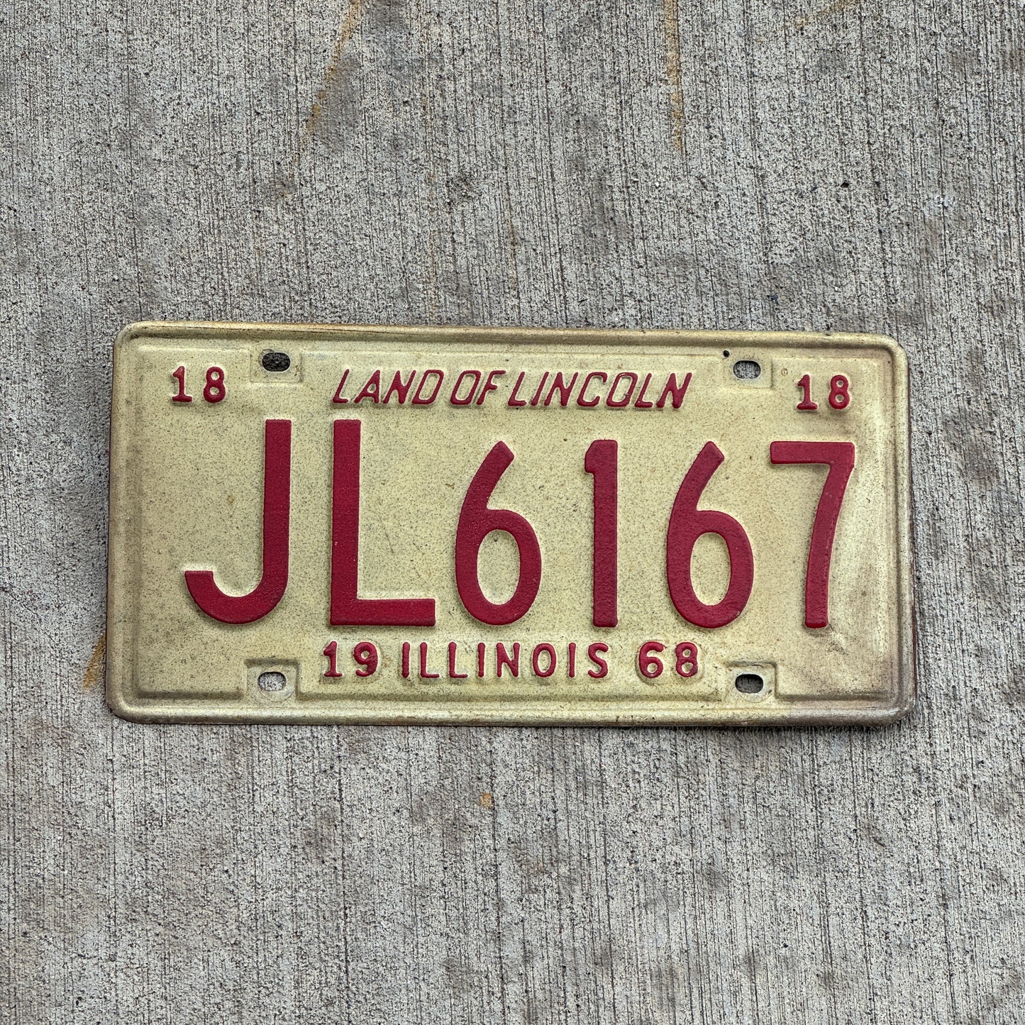 Photo of a 1968 Illinois License Plate Auto Tag 2 Vintage Garage JL 6167 with original patina