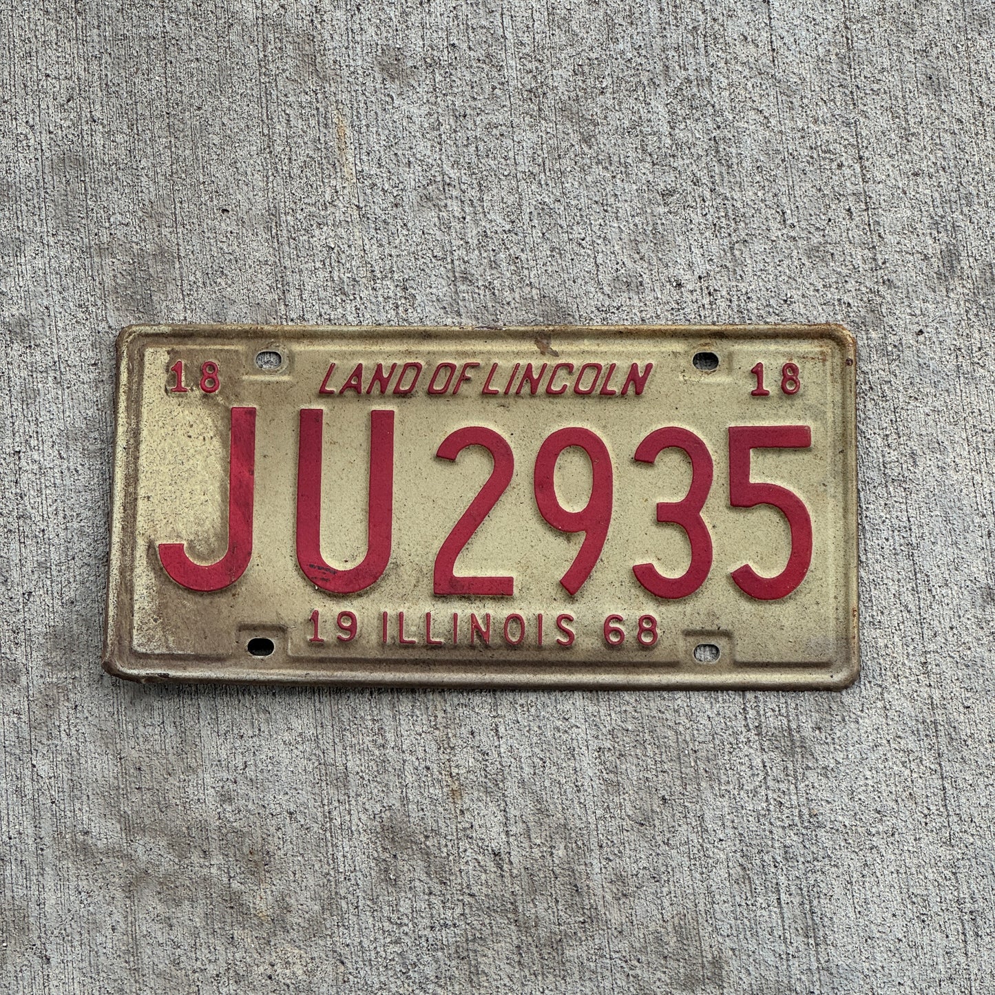 Photo of a 1968 Illinois License Plate Auto Tag 2 Vintage Garage JU 2935 with original patina