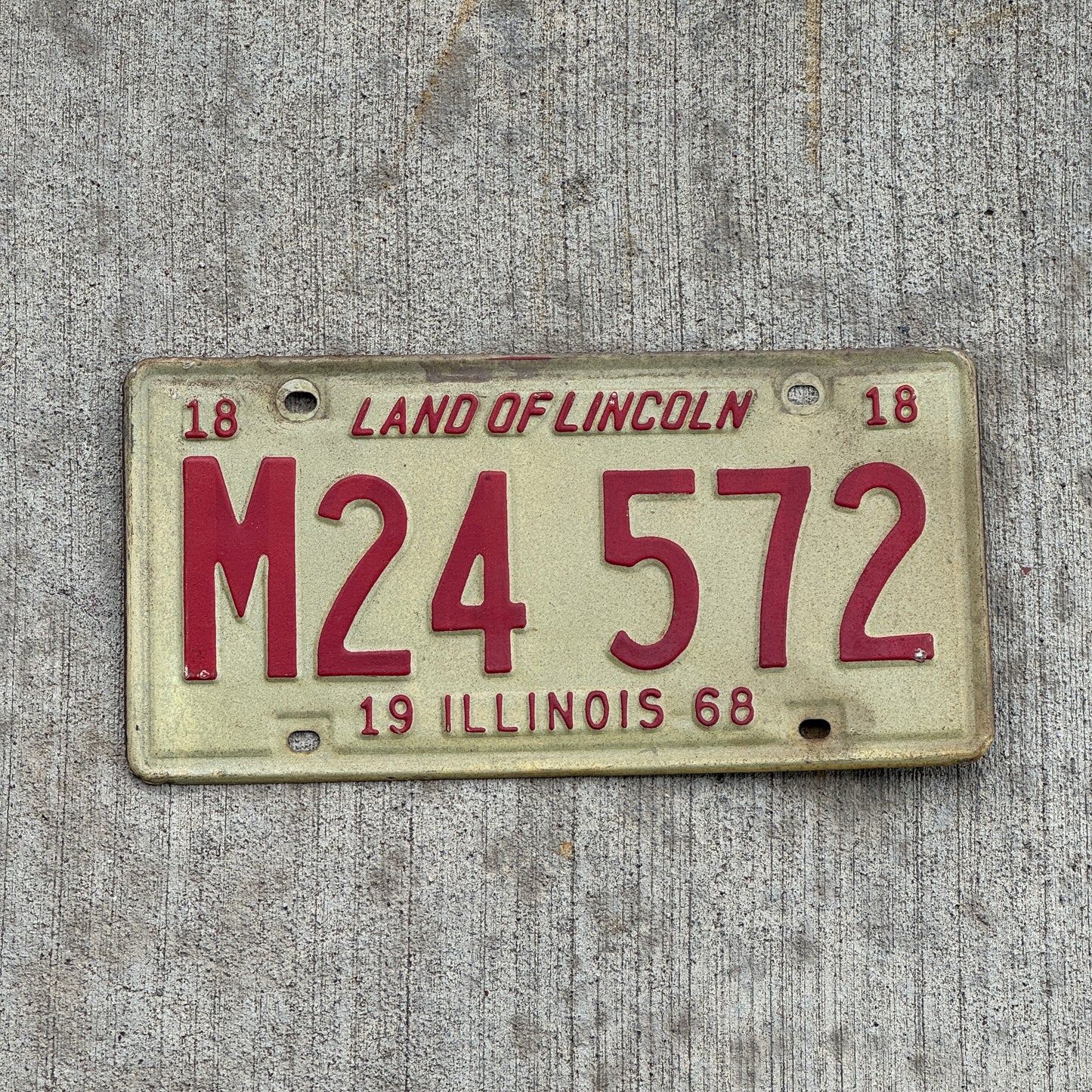 Photo of a 1968 Illinois Municipal License Plate Auto Tag 1 Vintage Garage M 24 572 with original patina