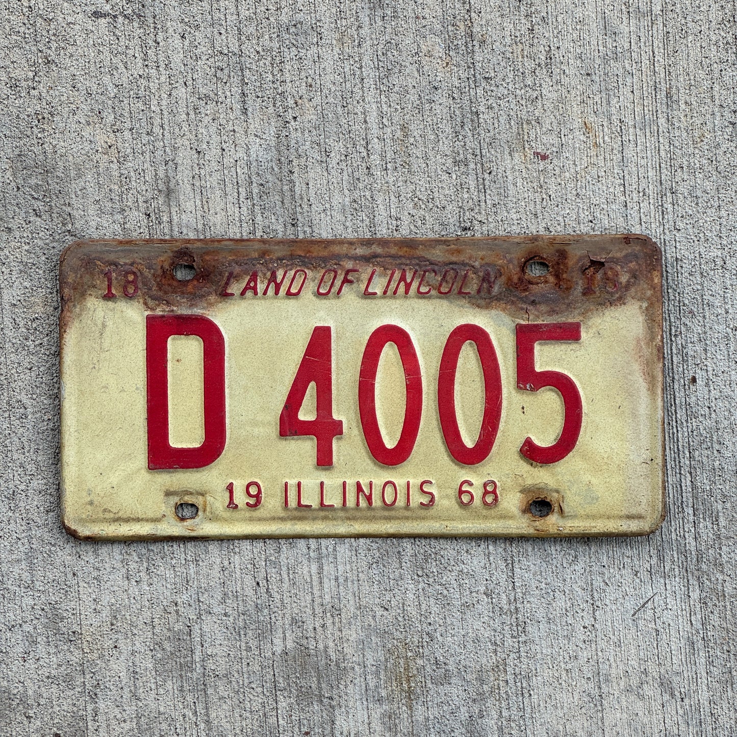Photo of a 1968 Illinois Truck License Plate Auto Tag Garage Decor Vintage D 4005 with original patina