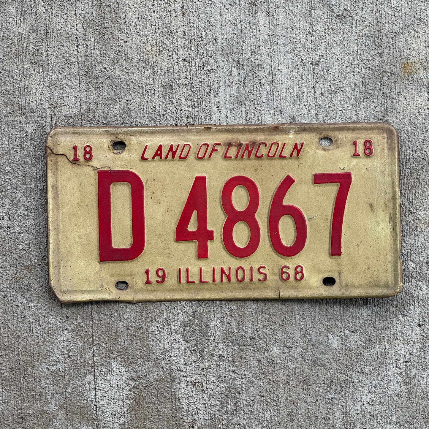 Photo of a 1968 Illinois Truck License Plate Auto Tag Garage Decor Vintage D 4867 with original patina