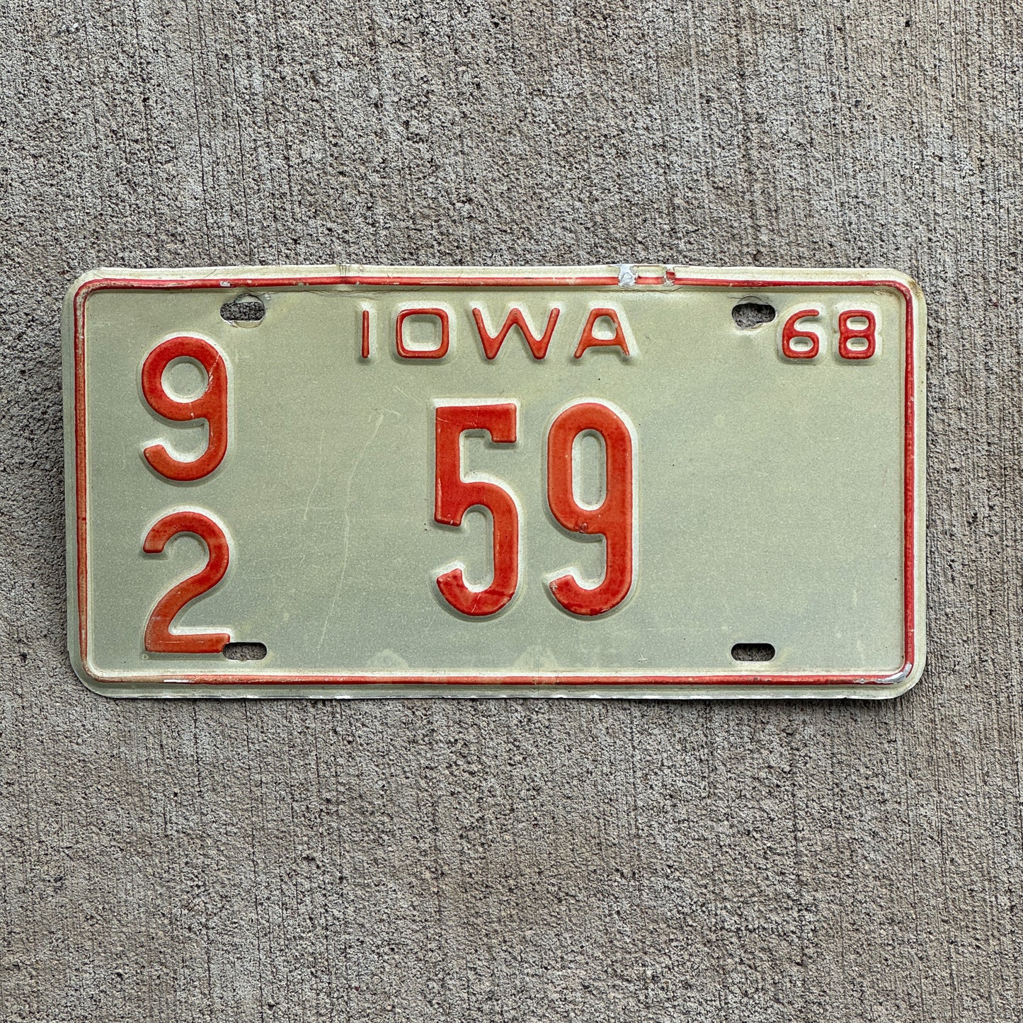 Photo of a 1968 Iowa License Plate Auto Tag Garage Decor Vintage Washington County Low Number 92 59 with original patina
