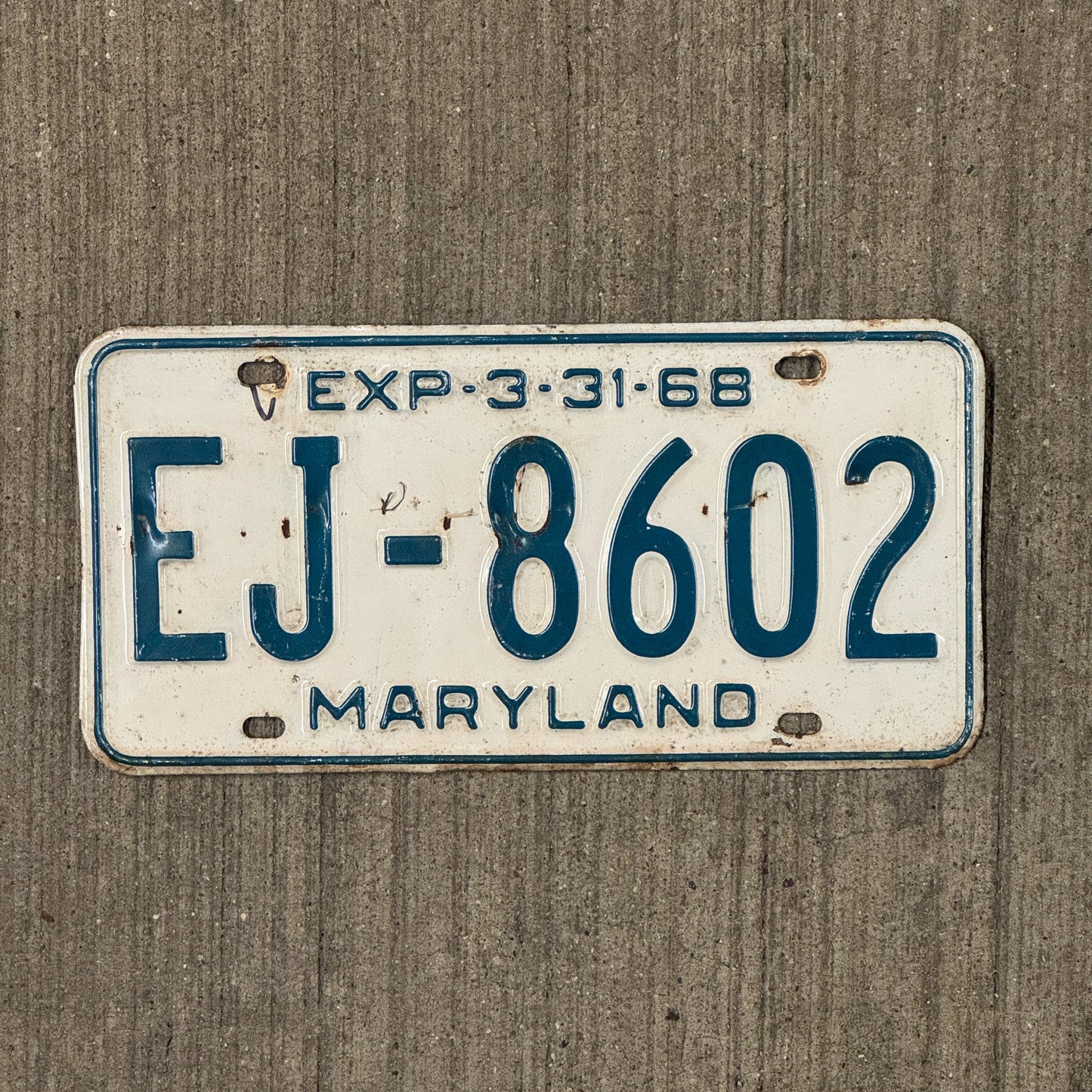 Photo of a 1968 Maryland License Plate Auto Tag Garage Decor Vintage EJ 8602 with original patina