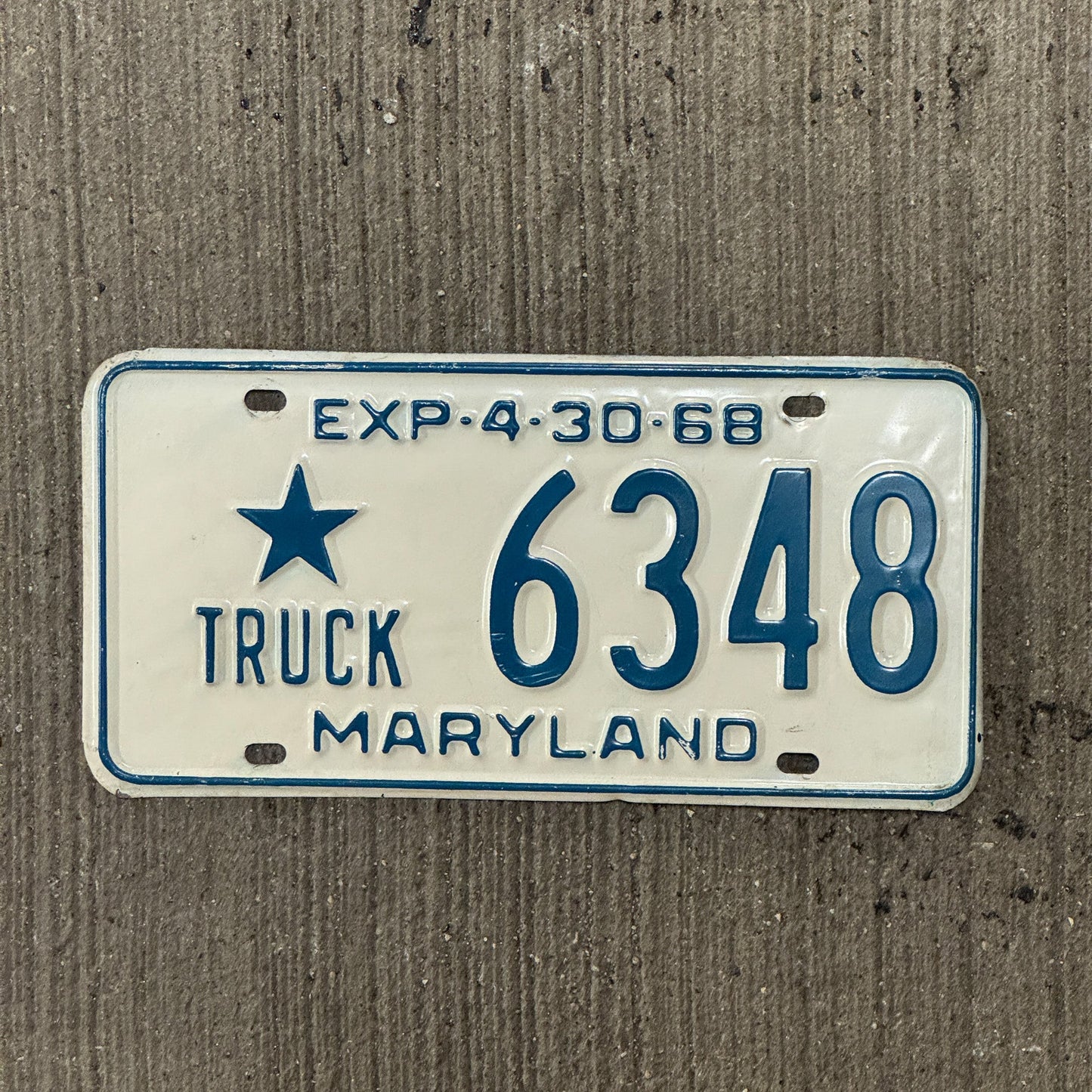 Photo of a 1968 Maryland Local Government Truck License Plate Auto Tag Garage Decor Vintage Star 6348