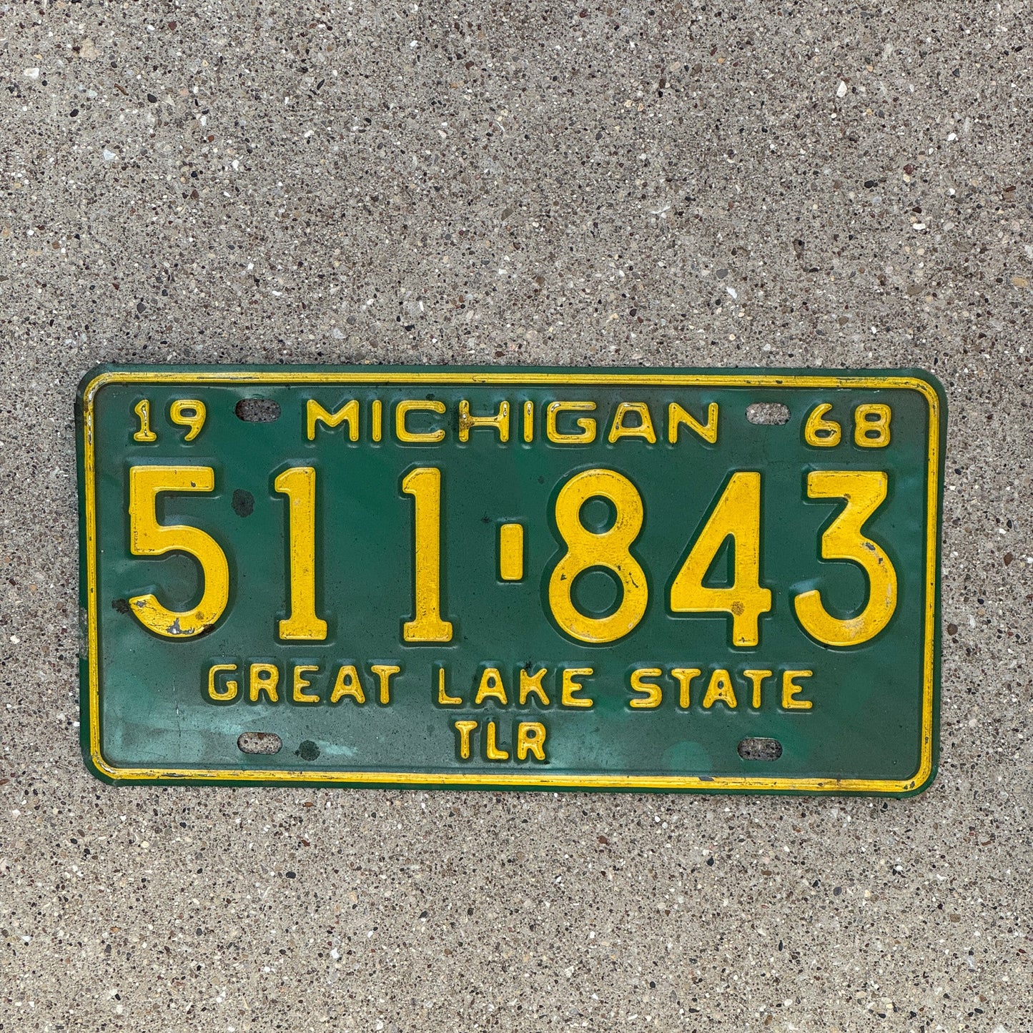 Photo of a 1968 Michigan Trailer License Plate Auto Tag Garage Decor Vintage 511 843