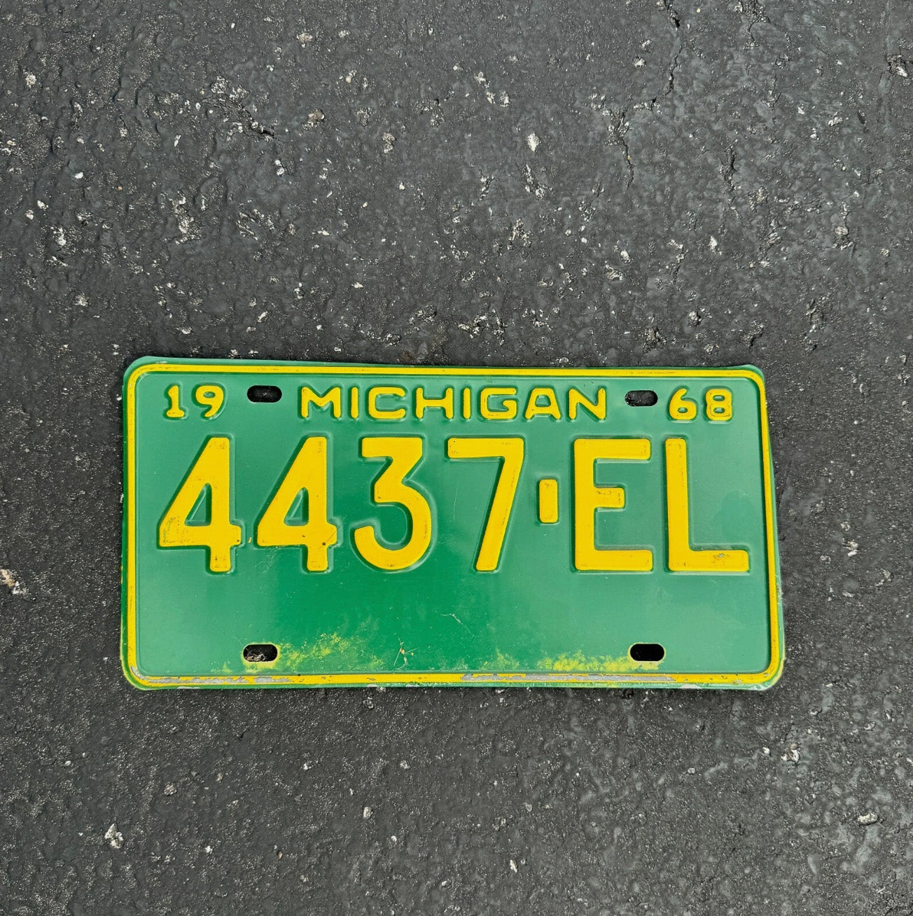 Photo of a 1968 Michigan Truck License Plate Auto Tag Garage Decor Vintage 4437 EL