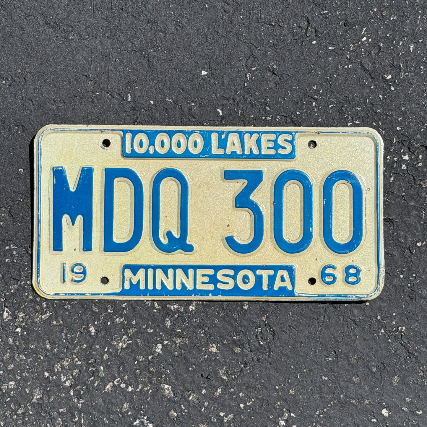 Photo of a 1968 Minnesota License Plate Auto Tag Garage Decor Vintage MDQ 300 with original patina