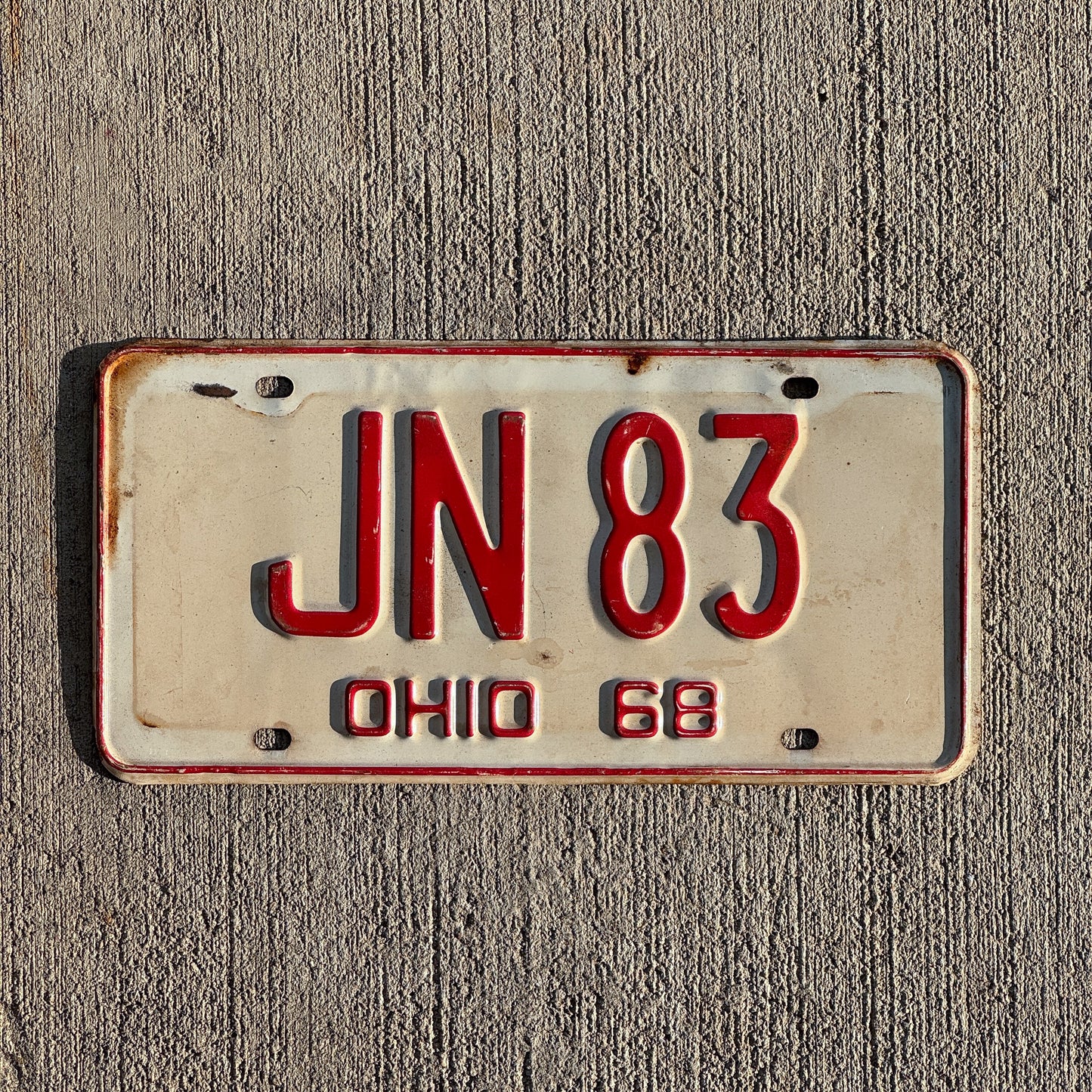 Photo of a 1968 Ohio License Plate Auto Tag Garage Decor Vintage JN 83 with original patina
