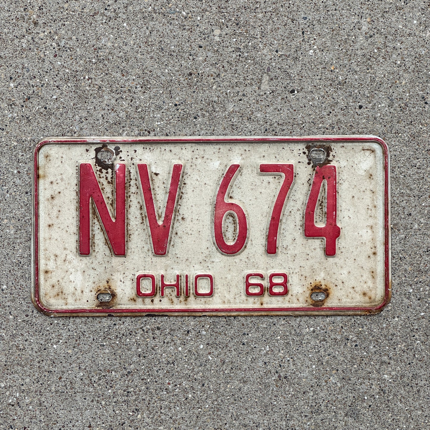 Photo of a 1968 Ohio License Plate Auto Tag Garage Decor Vintage NV 674 with original patina