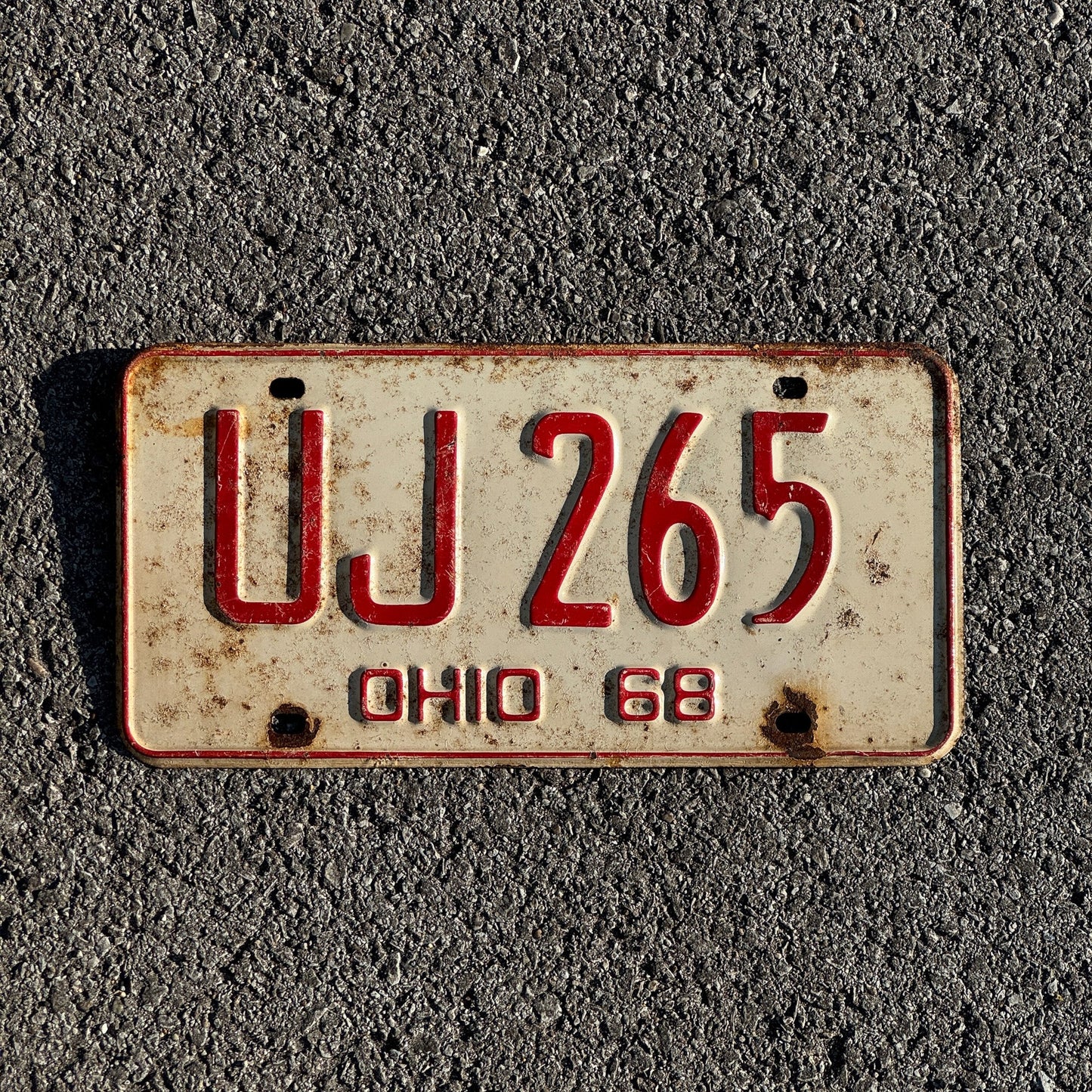 Photo of a 1968 Ohio License Plate Auto Tag Garage Decor Vintage UJ 265