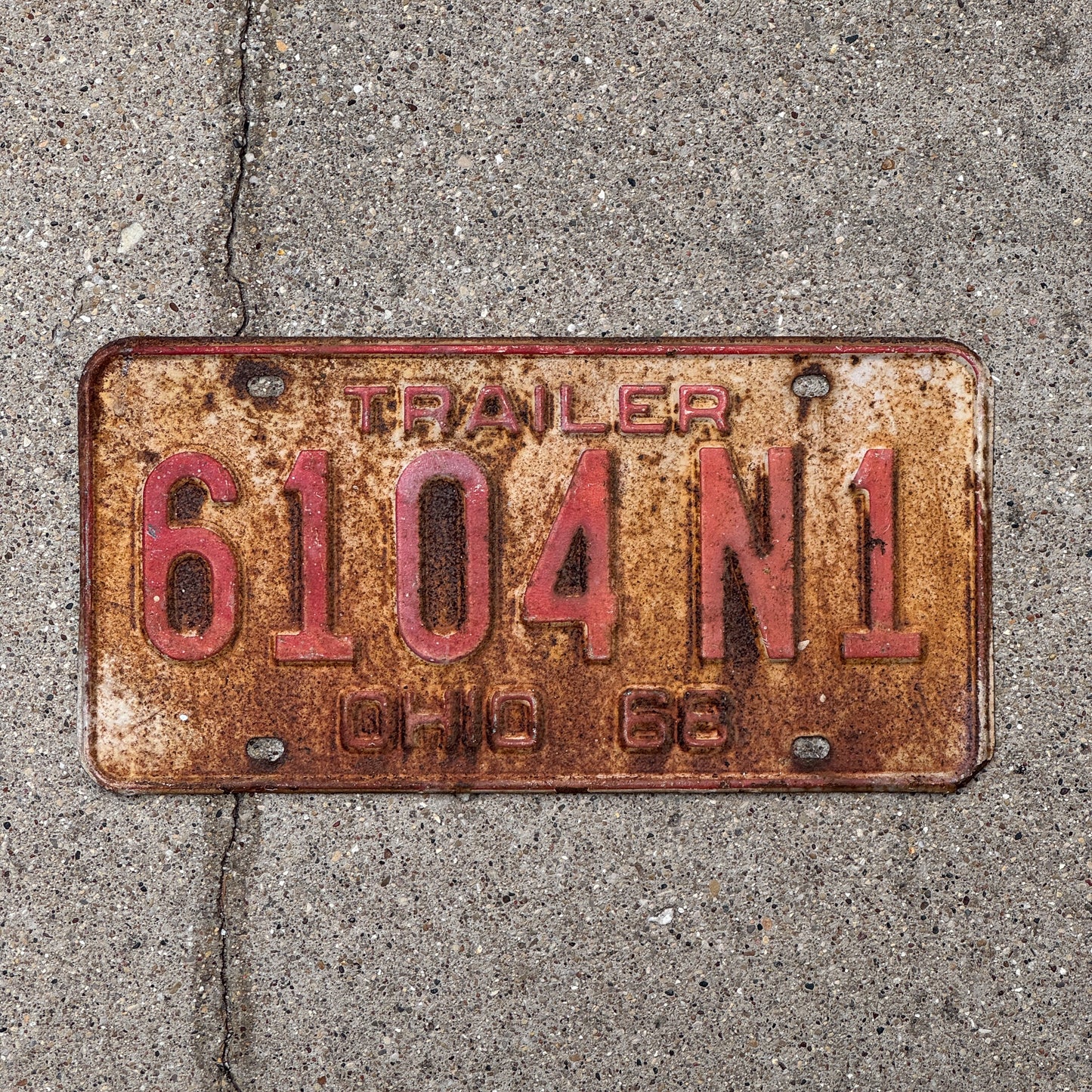 Photo of a 1968 Ohio Trailer License Plate Auto Tag Garage Decor Vintage 6104 N 1 with original patina
