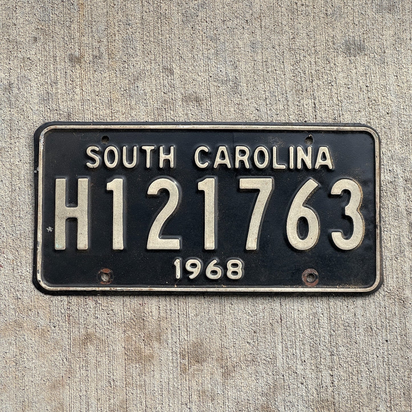 Photo of a 1968 South Carolina Truck License Plate Auto Tag Garage Decor Vintage H 121763 with original patina
