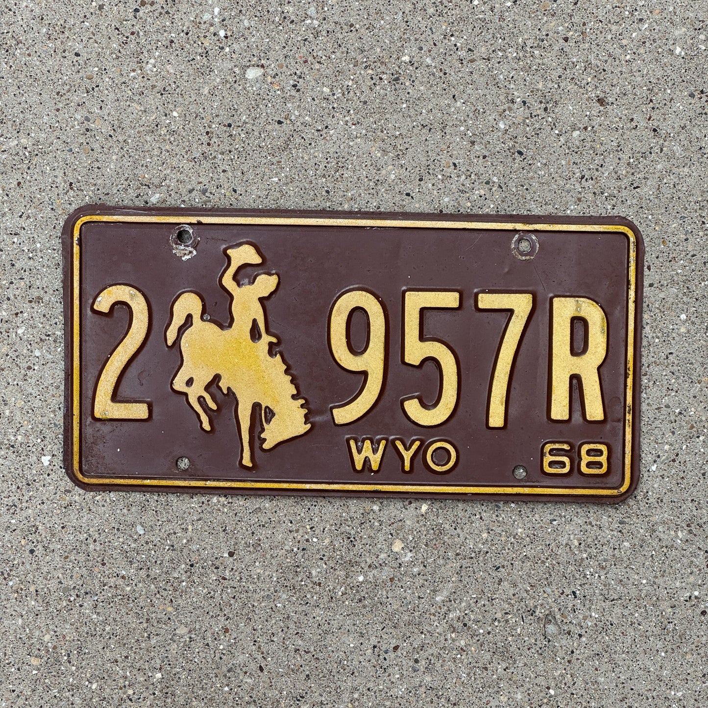 Photo of a 1968 Wyoming License Plate Auto Tag Garage Decor Vintage University Colors 2 957 R