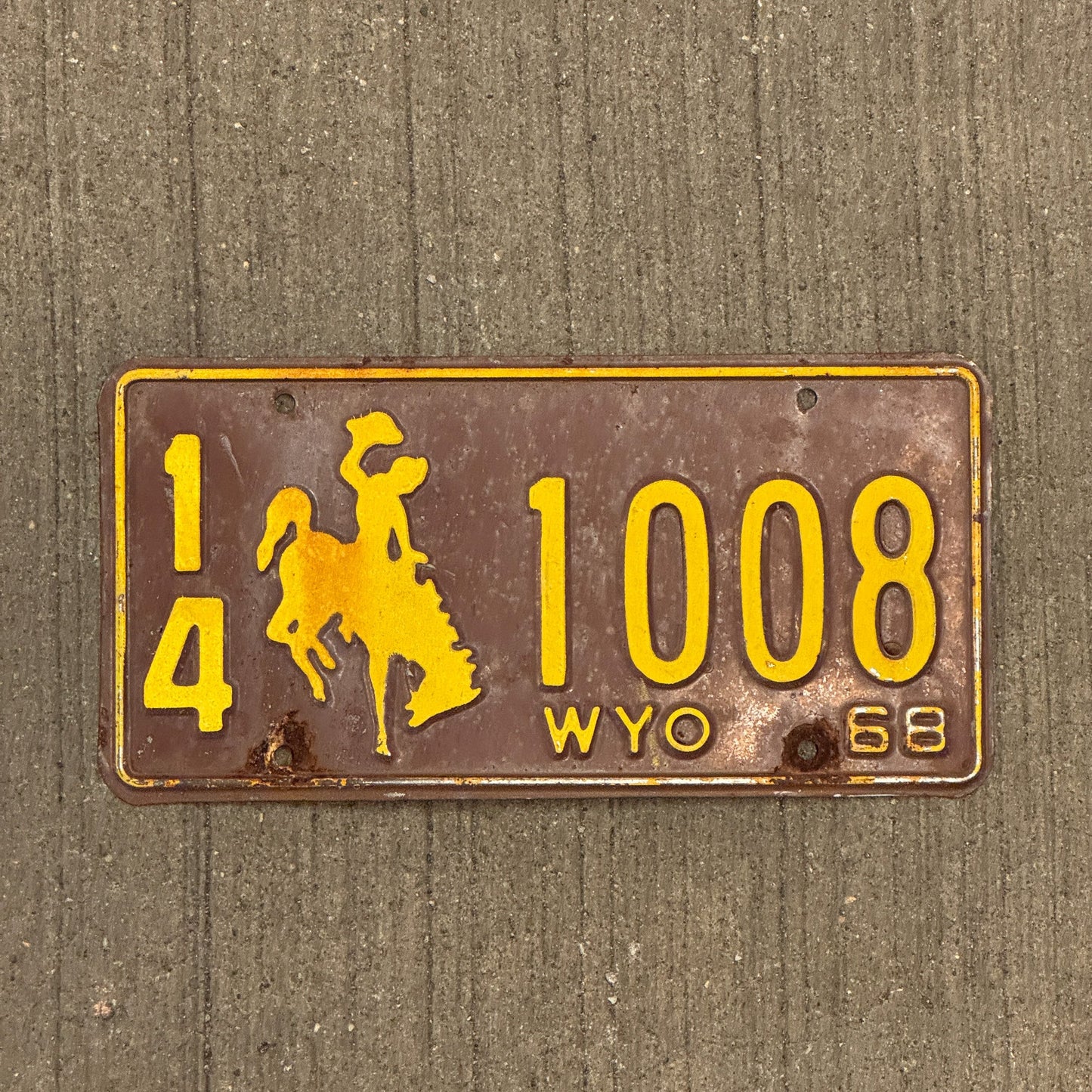 Photo of a 1968 Wyoming License Plate Auto Tag Garage Decor Vintage University Colors Bronco 14 1008