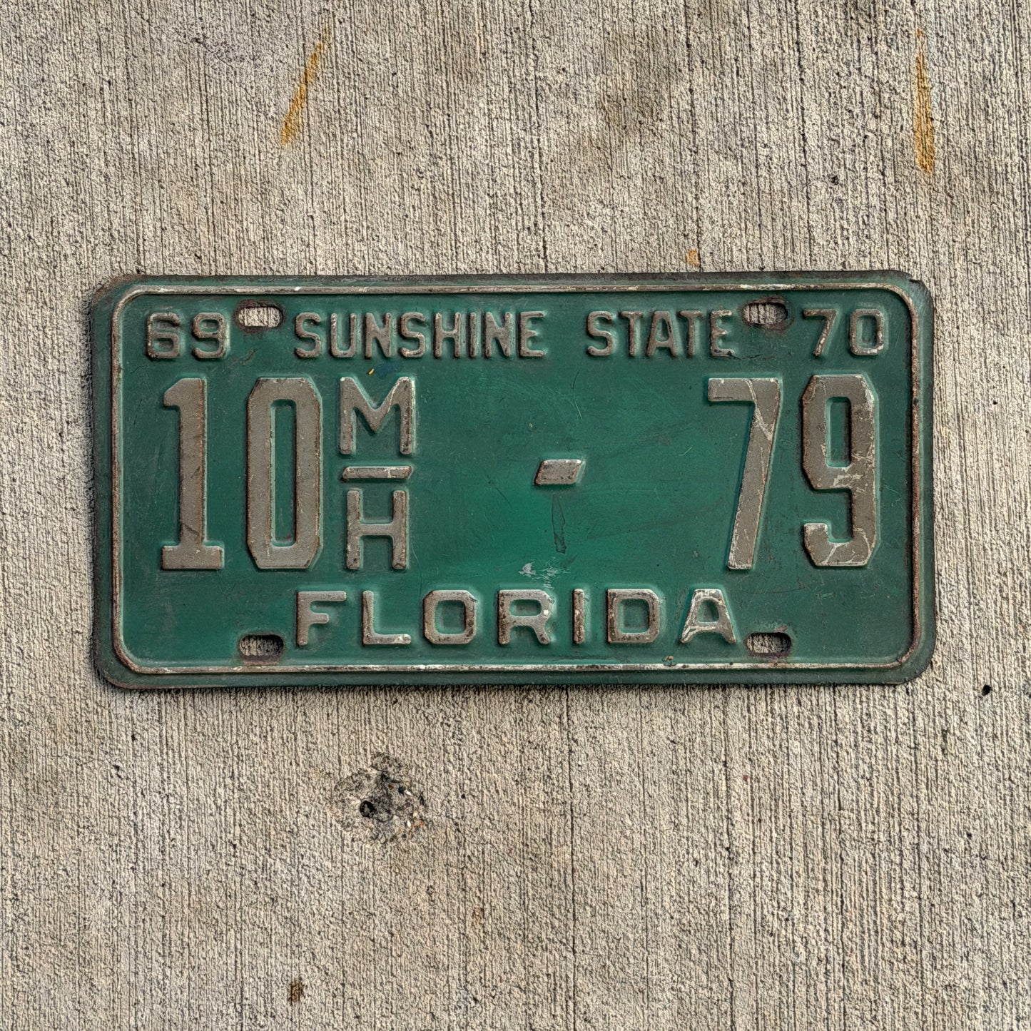 Photo of a 1969 1970 Florida Mobile Home License Plate Auto Tag Garage Decor Vintage 10 MH 79 with original patina