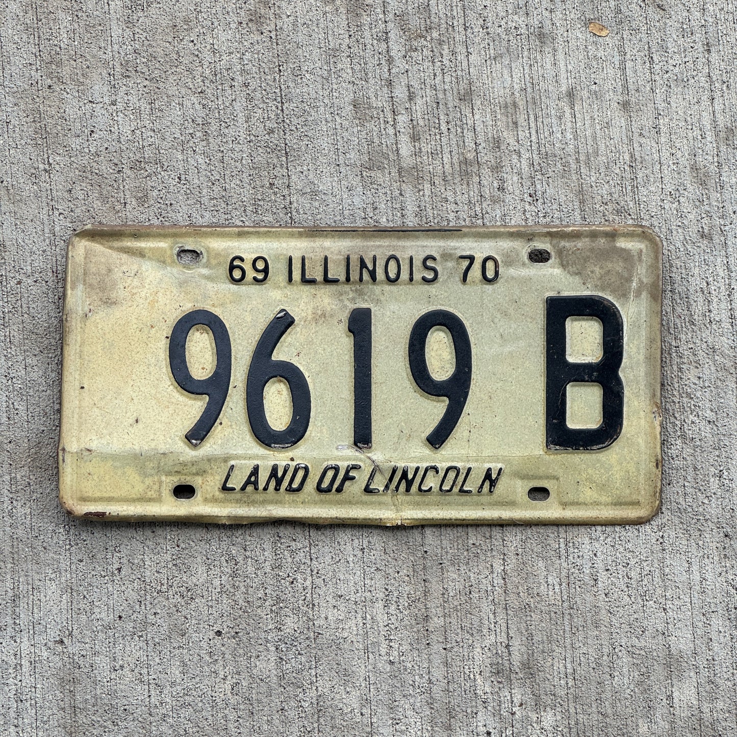 Photo of a 1969 1970 Illinois Truck License Plate Auto Tag Garage Decor Vintage 9619 B with original patina