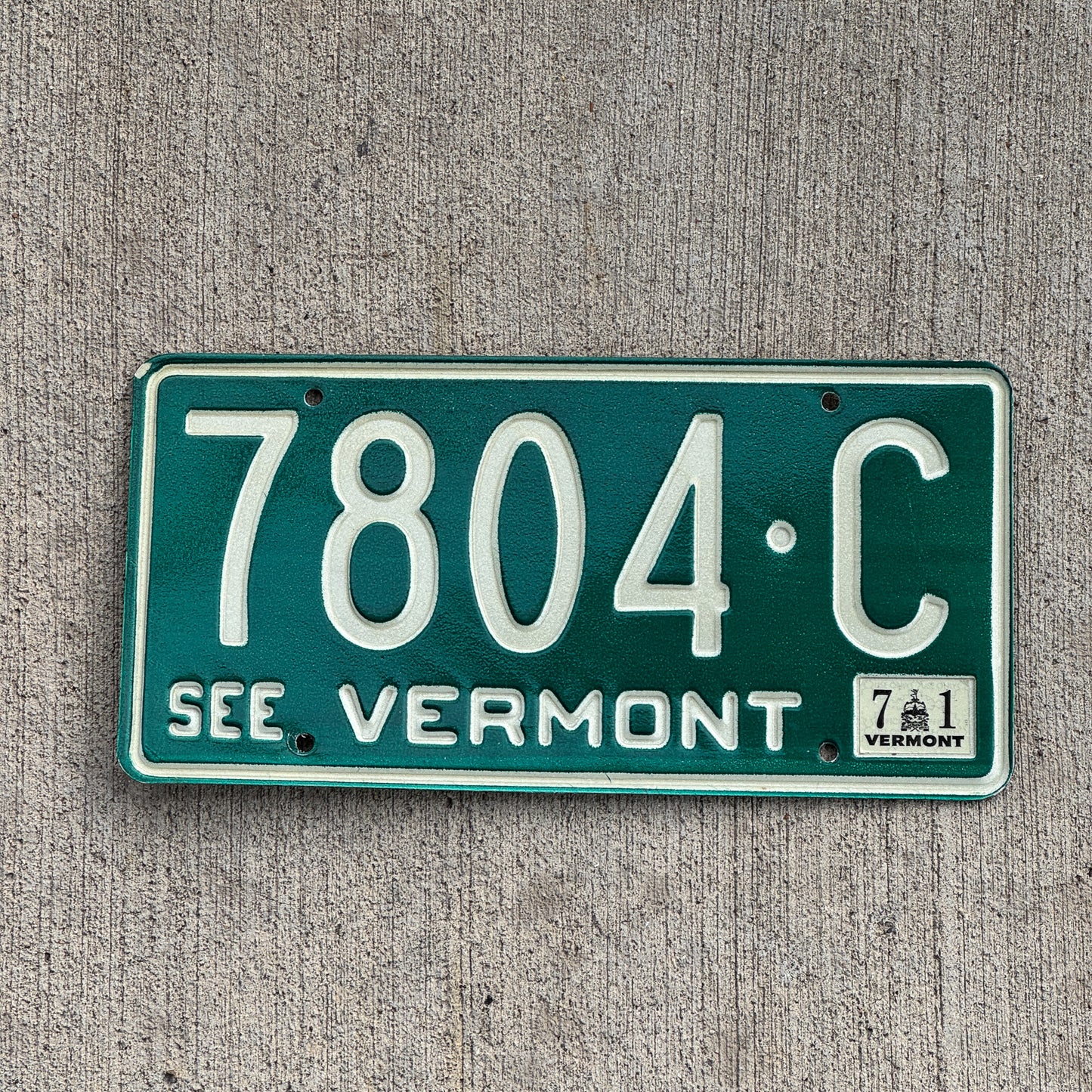 Photo of a 1969 1971 Vermont License Plate Auto Tag Garage Decor Vintage 7804 C with original patina