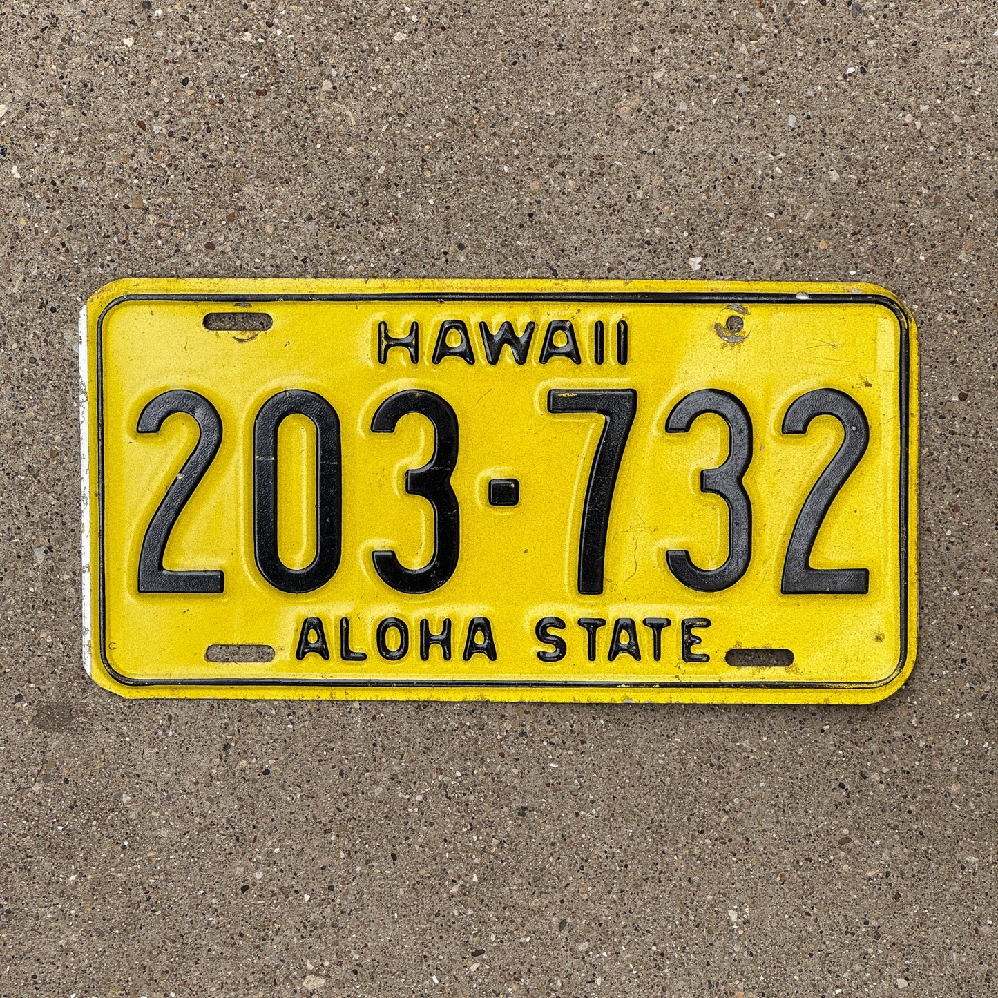 Photo of a 1969 Hawaii TRUCK License Plate Auto Tag Garage Decor Vintage Yellow 203 732