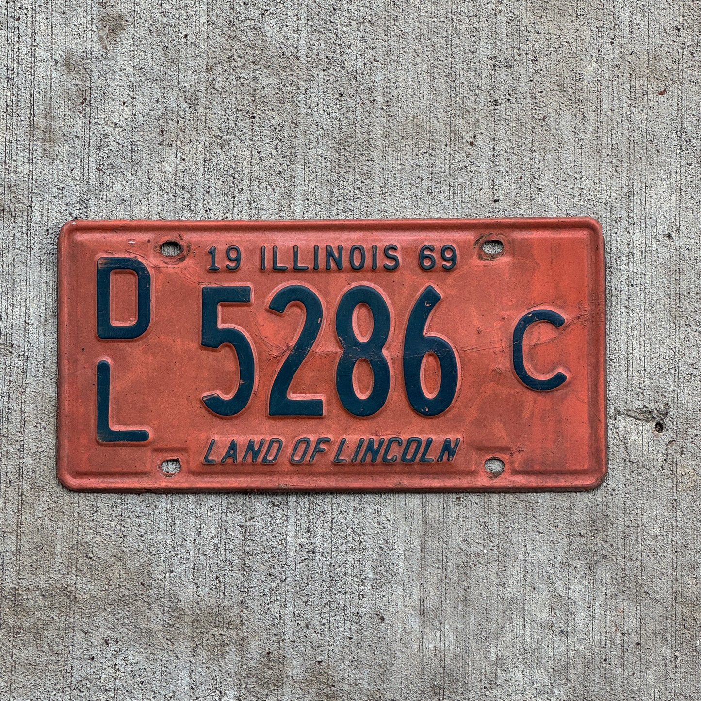 Photo of a 1969 Illinois Dealer License Plate Auto Tag 1 Vintage Garage 5286 C with original patina