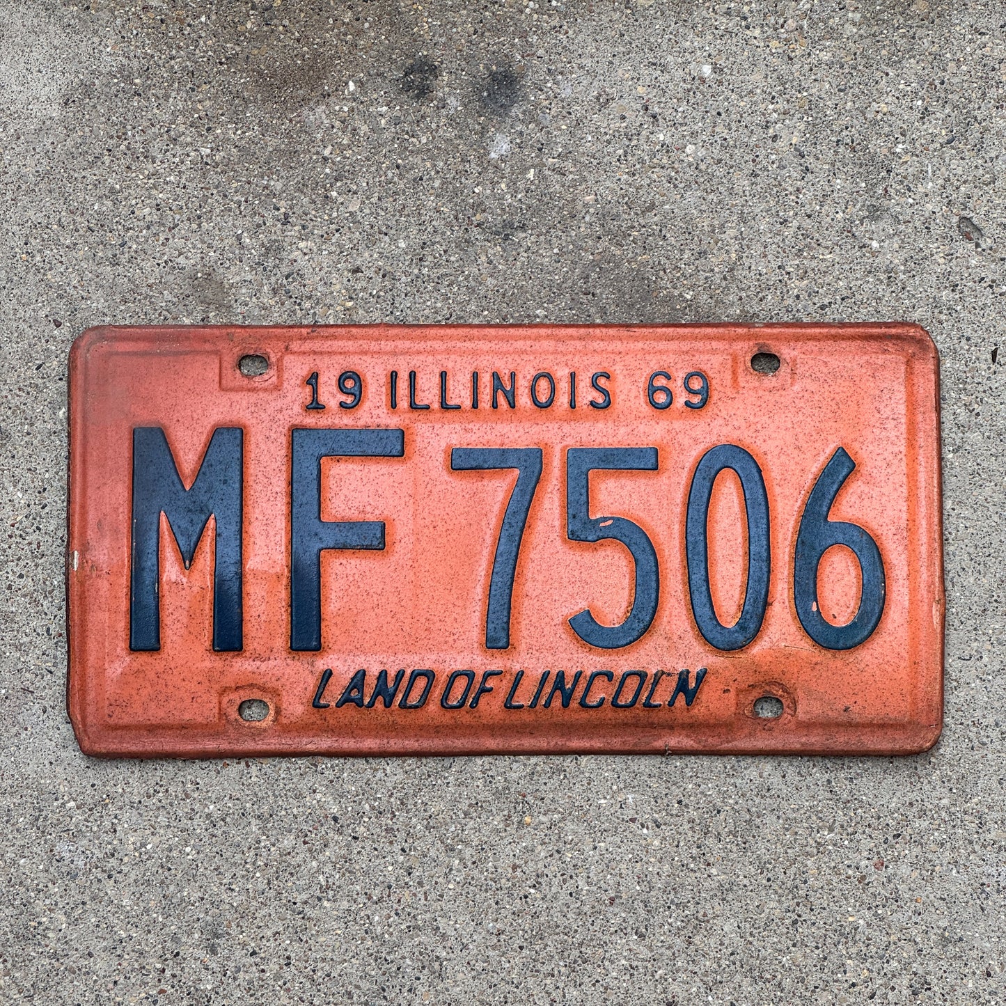 Photo of a 1969 Illinois License Plate Auto Tag 1 Vintage Garage MF 7506 with original patina