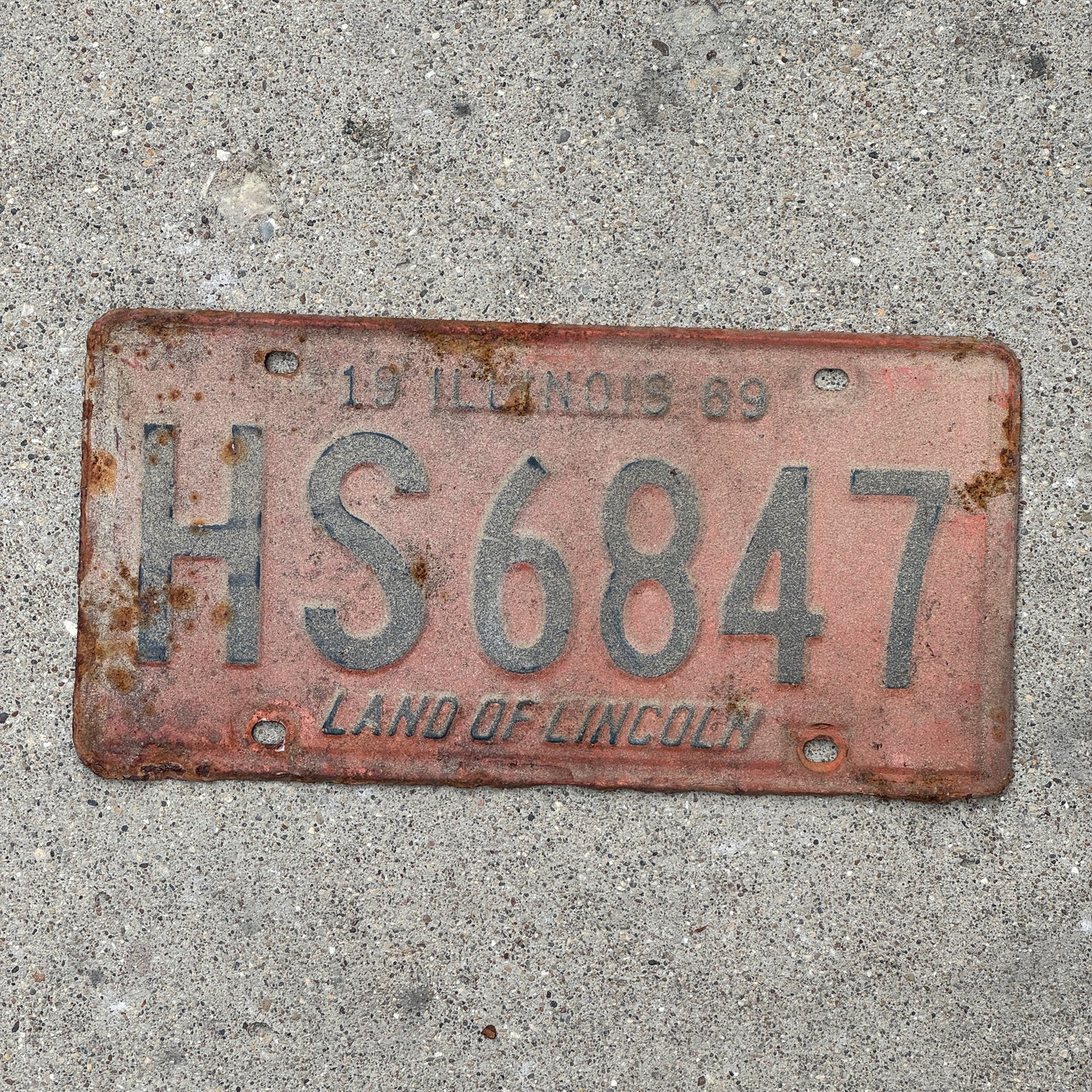 Photo of a 1969 Illinois License Plate Auto Tag 2 Vintage Garage HS 6847 with original patina