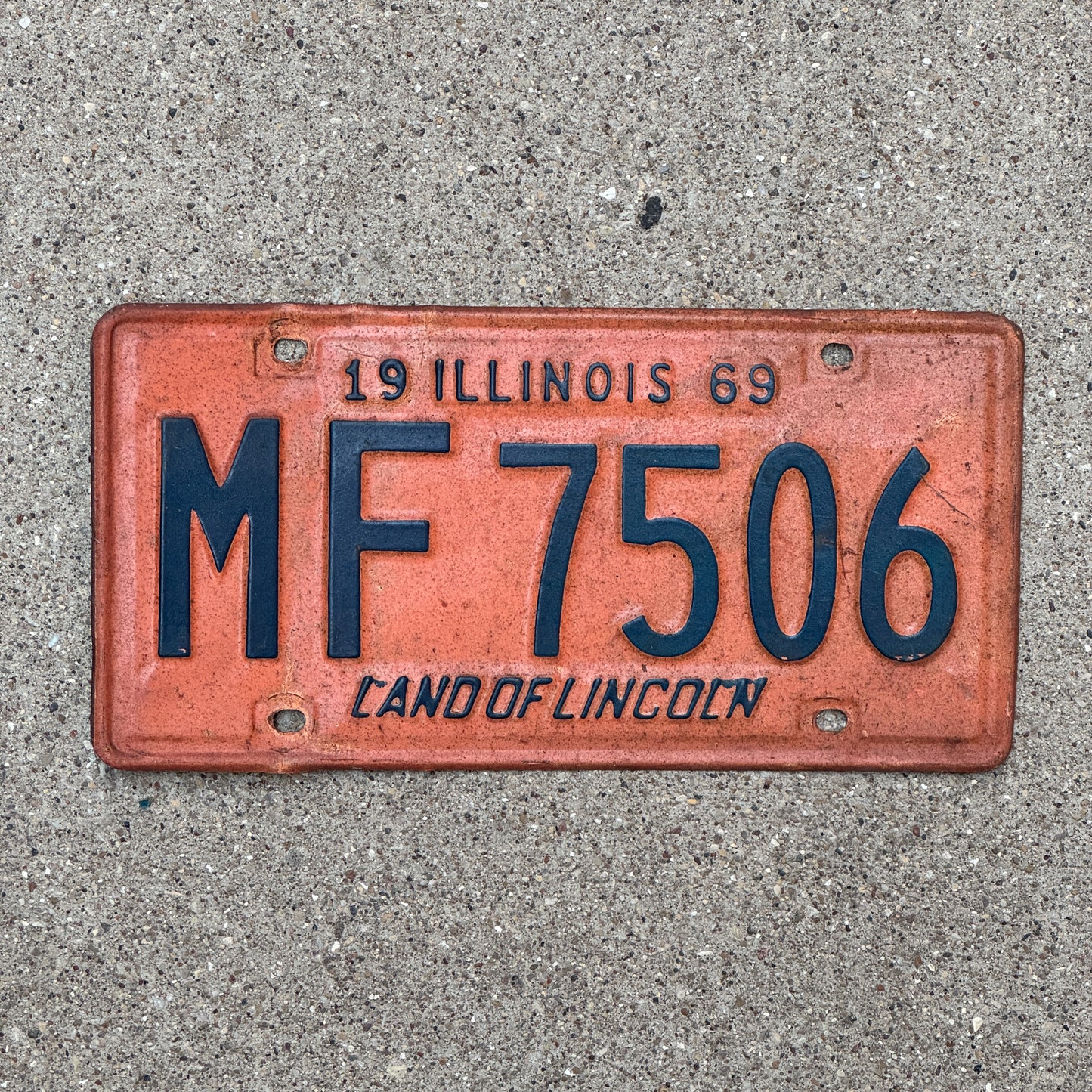 Photo of a 1969 Illinois License Plate Auto Tag 2 Vintage Garage MF 7506 with original patina