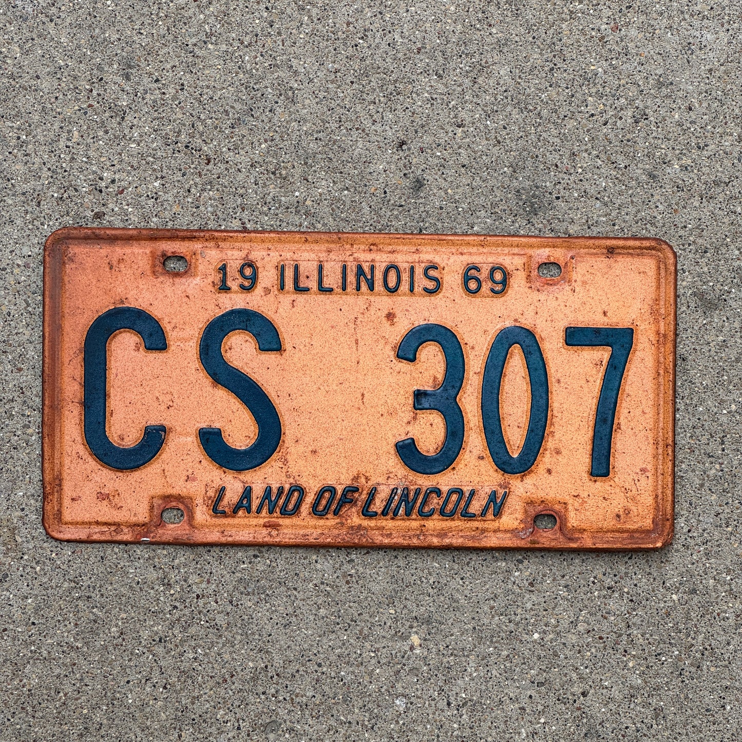 Photo of a 1969 Illinois License Plate Auto Tag Garage Decor Vintage CS 307 with original patina