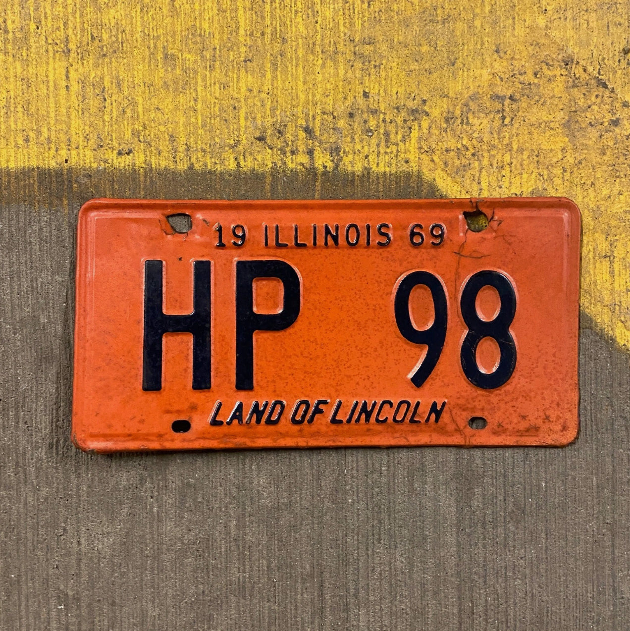 Photo of a 1969 Illinois License Plate Auto Tag Garage Decor Vintage HP 98 with original patina