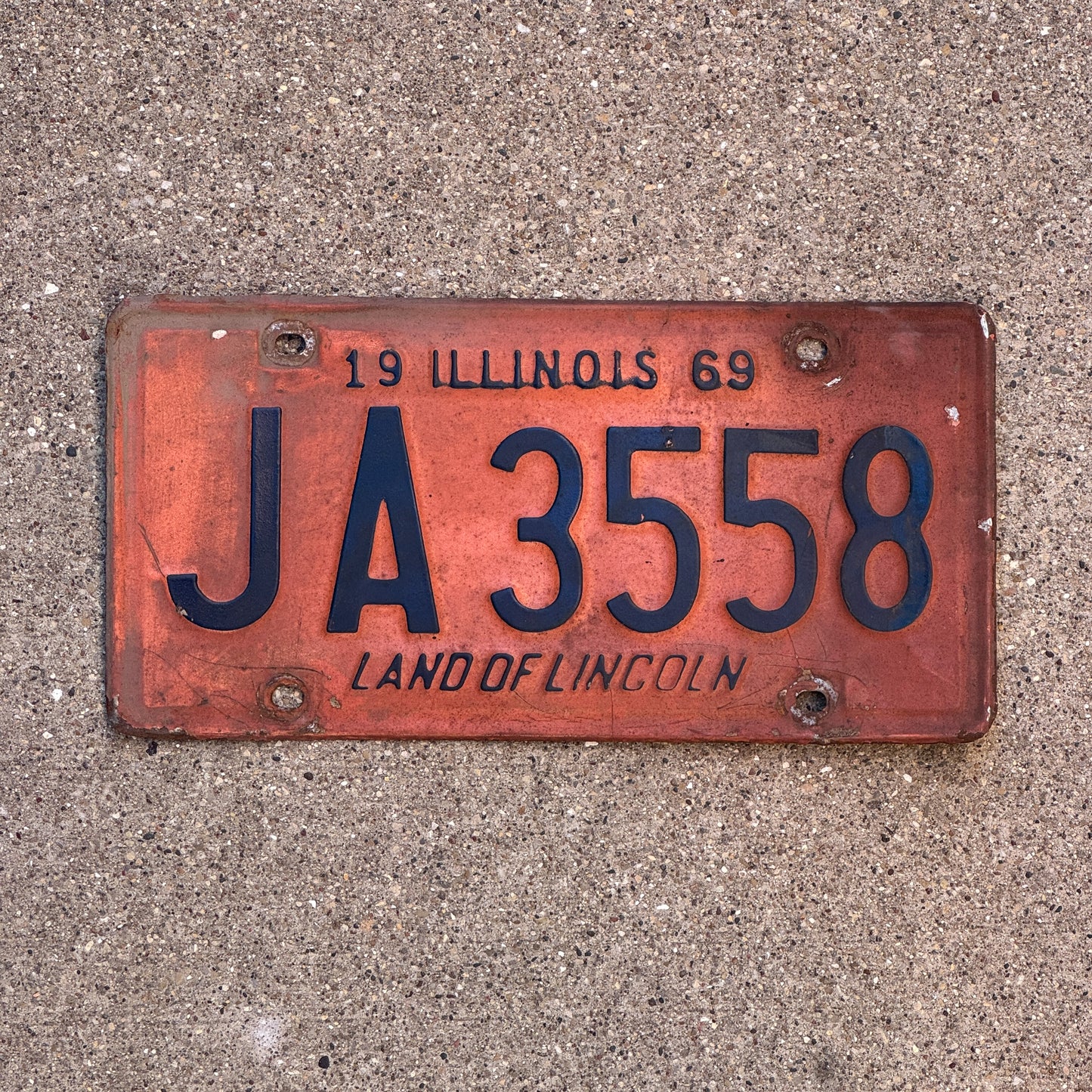Photo of a 1969 Illinois License Plate Auto Tag Garage Decor Vintage JA 3558 with original patina
