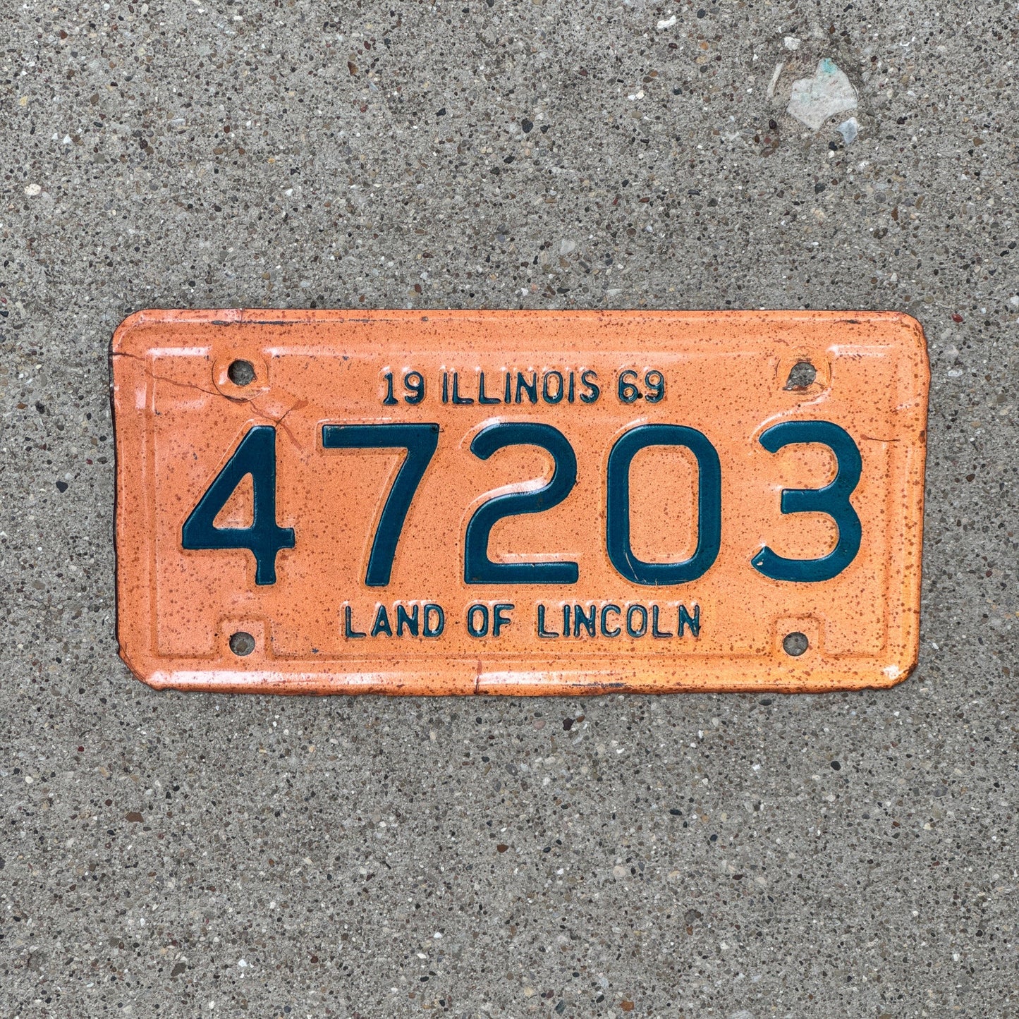 Photo of a 1969 Illinois Motorcycle License Plate Auto Tag Garage Decor Vintage 47203
