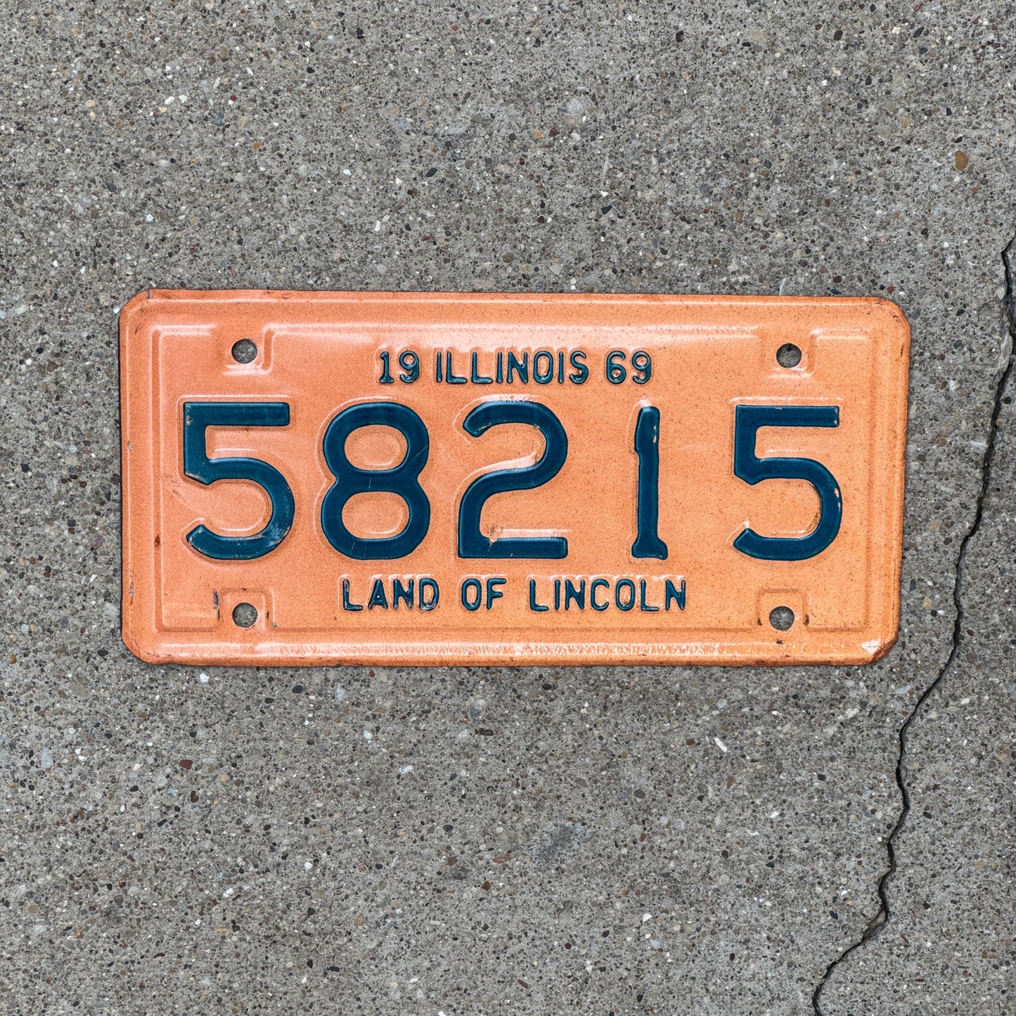 Photo of a 1969 Illinois Motorcycle License Plate Auto Tag Garage Decor Vintage 58215