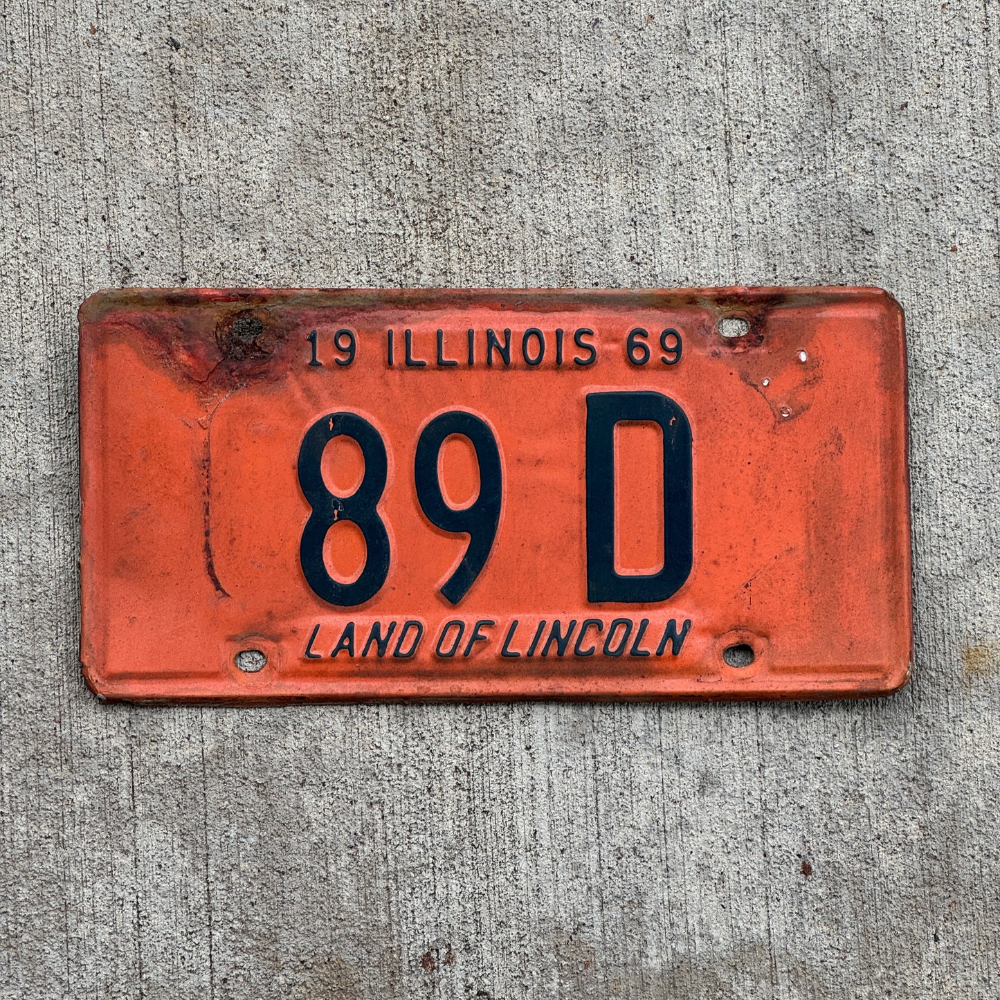Photo of a 1969 Illinois Truck License Plate Auto Tag Garage Decor Vintage Low Number Two Digit 89 D with original patina