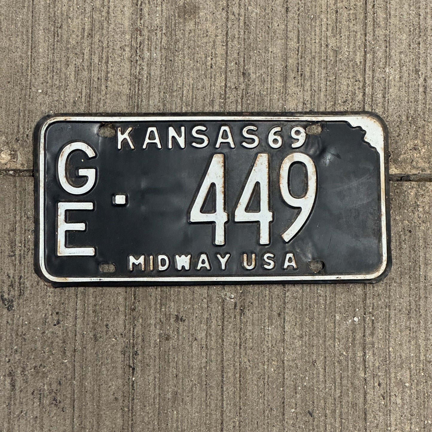 Photo of a 1969 Kansas License Plate Auto Tag Garage Decor Vintage Midway USA GE 449
